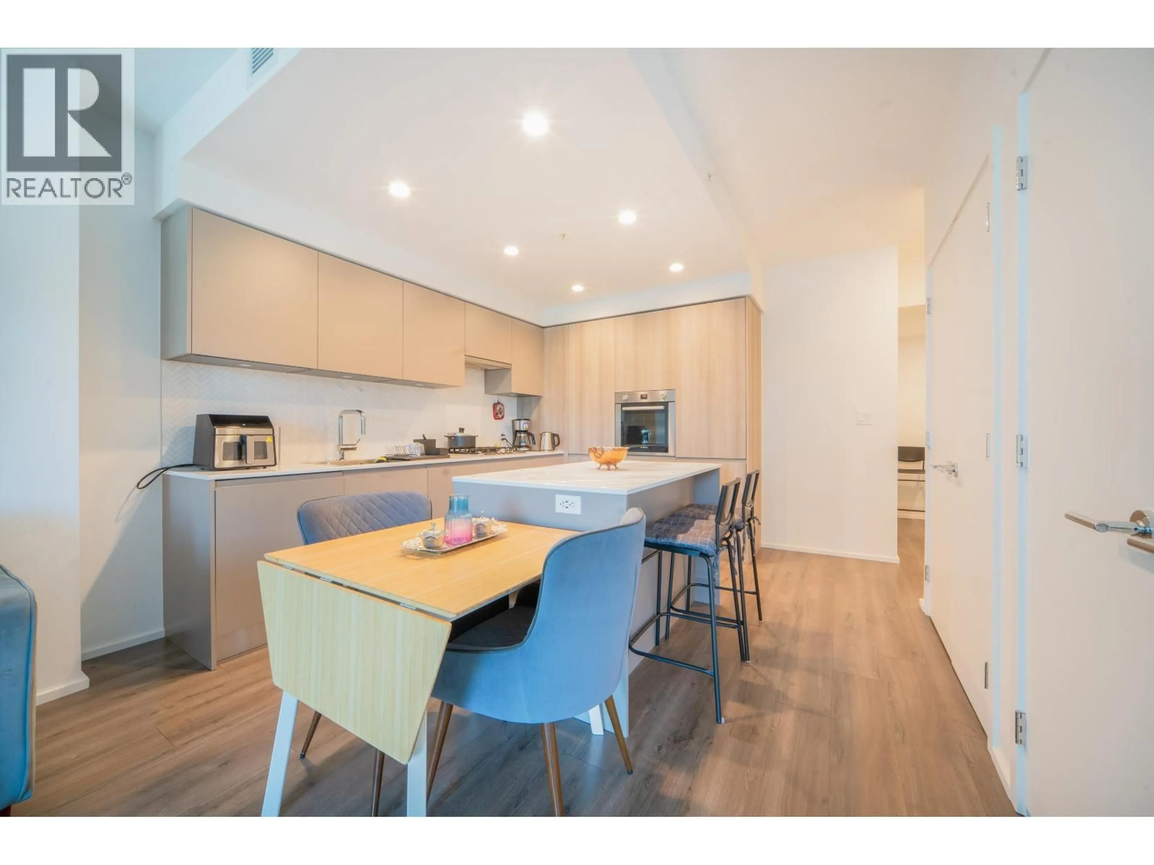 Open concept kitchen, wood/laminate floor for 3311 - 3833 EVERGREEN PLACE, Burnaby British Columbia V3J0M2