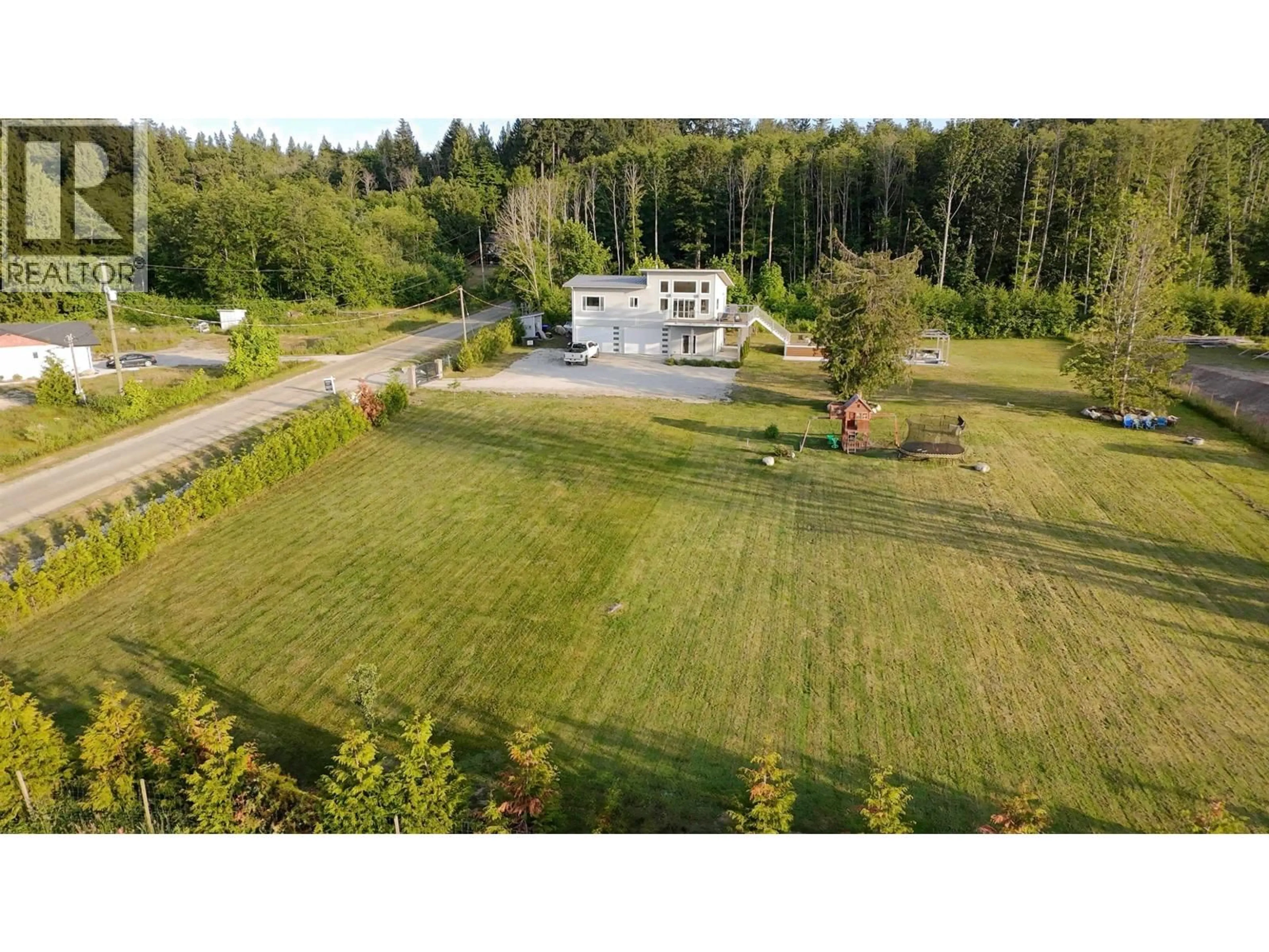 A pic from outside/outdoor area/front of a property/back of a property/a pic from drone, unknown for 6315 RIMROCK ROAD, Sechelt British Columbia V7Z0L1