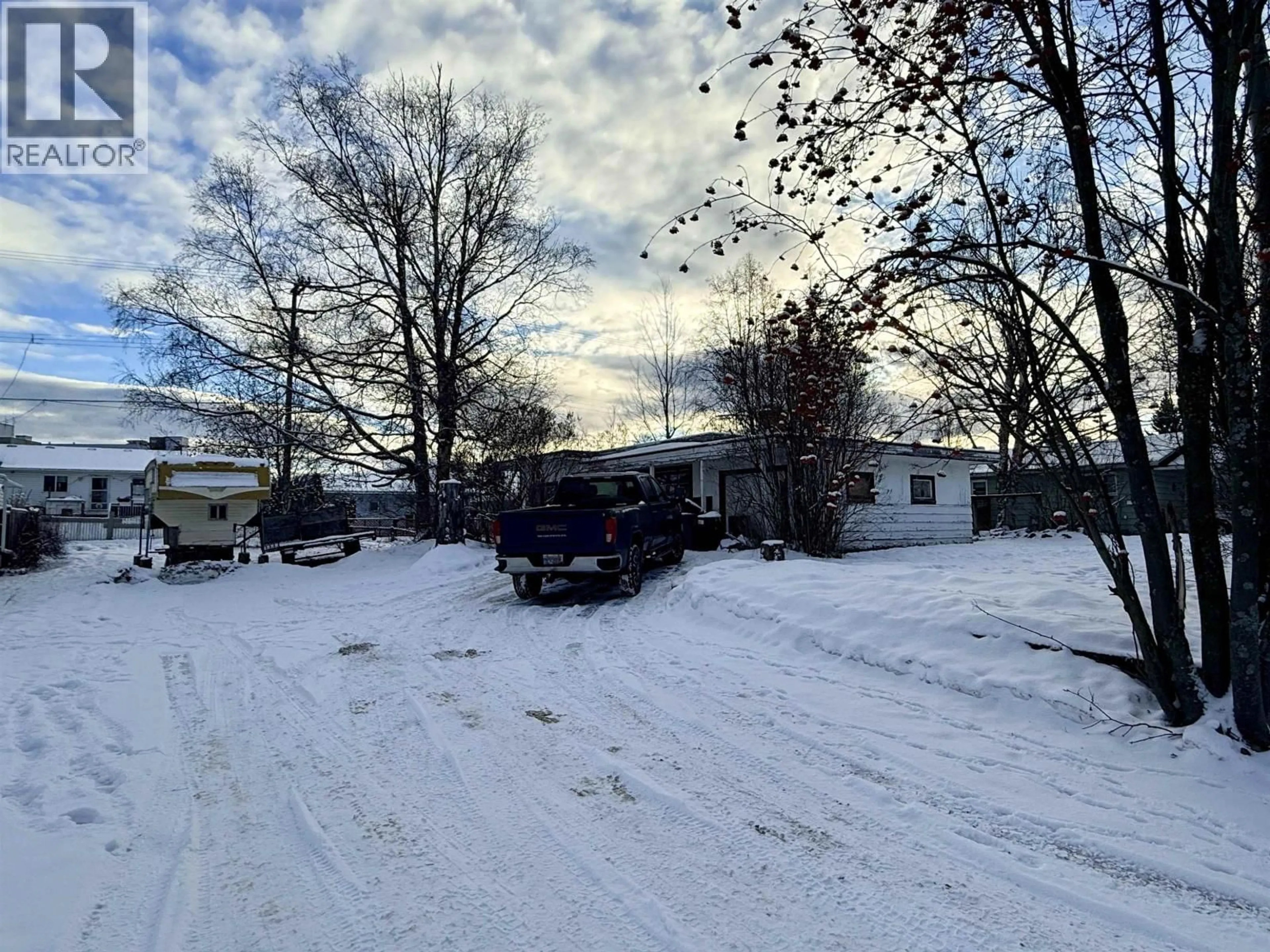 A pic from outside/outdoor area/front of a property/back of a property/a pic from drone, street for 1410 BURDEN STREET, Prince George British Columbia V2M2J6