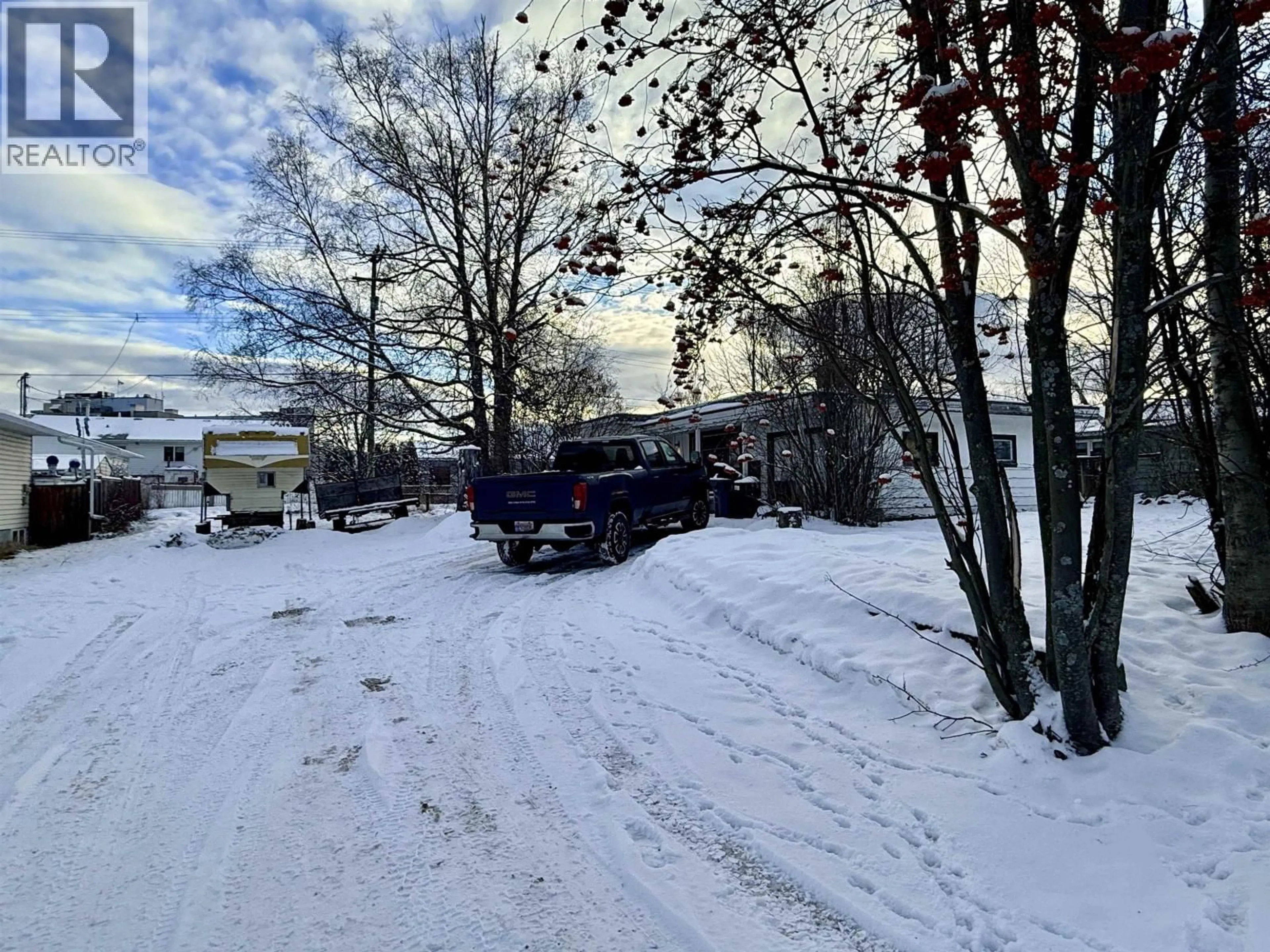 A pic from outside/outdoor area/front of a property/back of a property/a pic from drone, street for 1410 BURDEN STREET, Prince George British Columbia V2M2J6