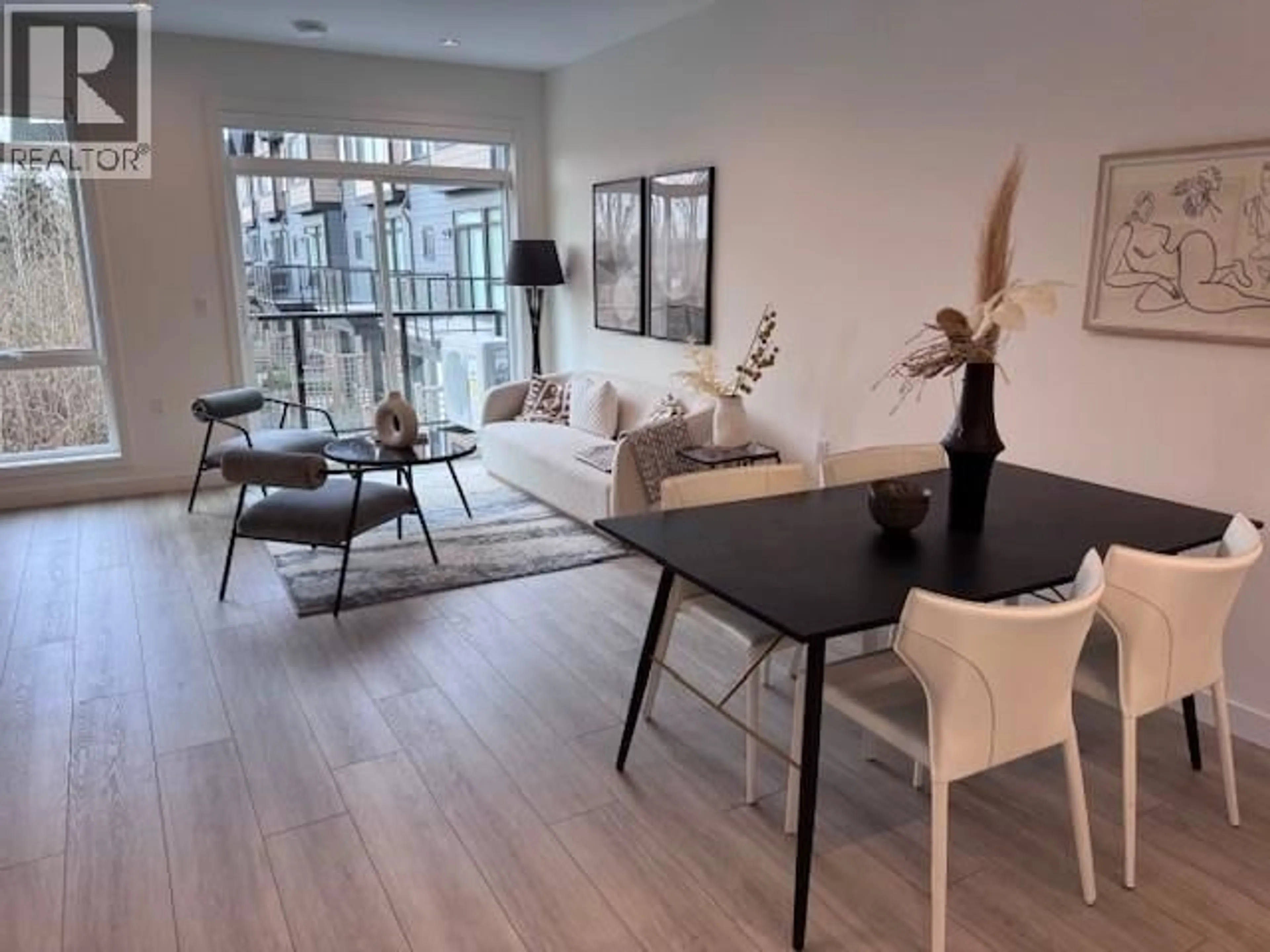 Living room with furniture, wood/laminate floor for 32 - 4337 BOUNDARY ROAD, Richmond British Columbia V6V0C4