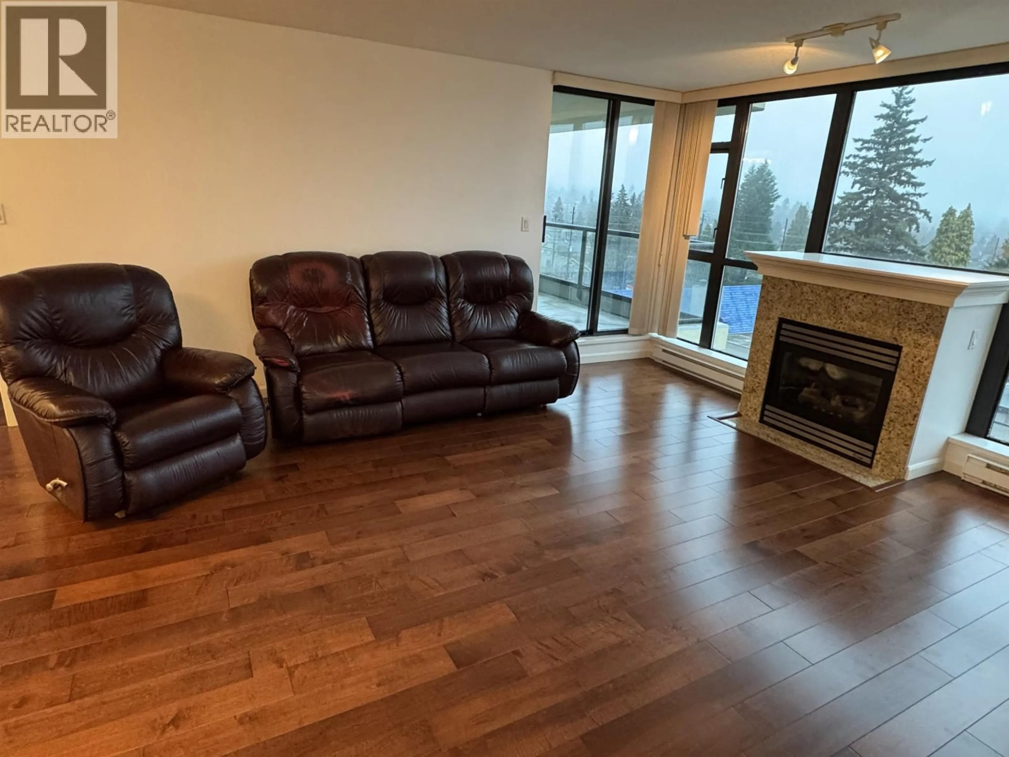 Living room with furniture, wood/laminate floor for 702 - 615 HAMILTON STREET, New Westminster British Columbia V3M7A7