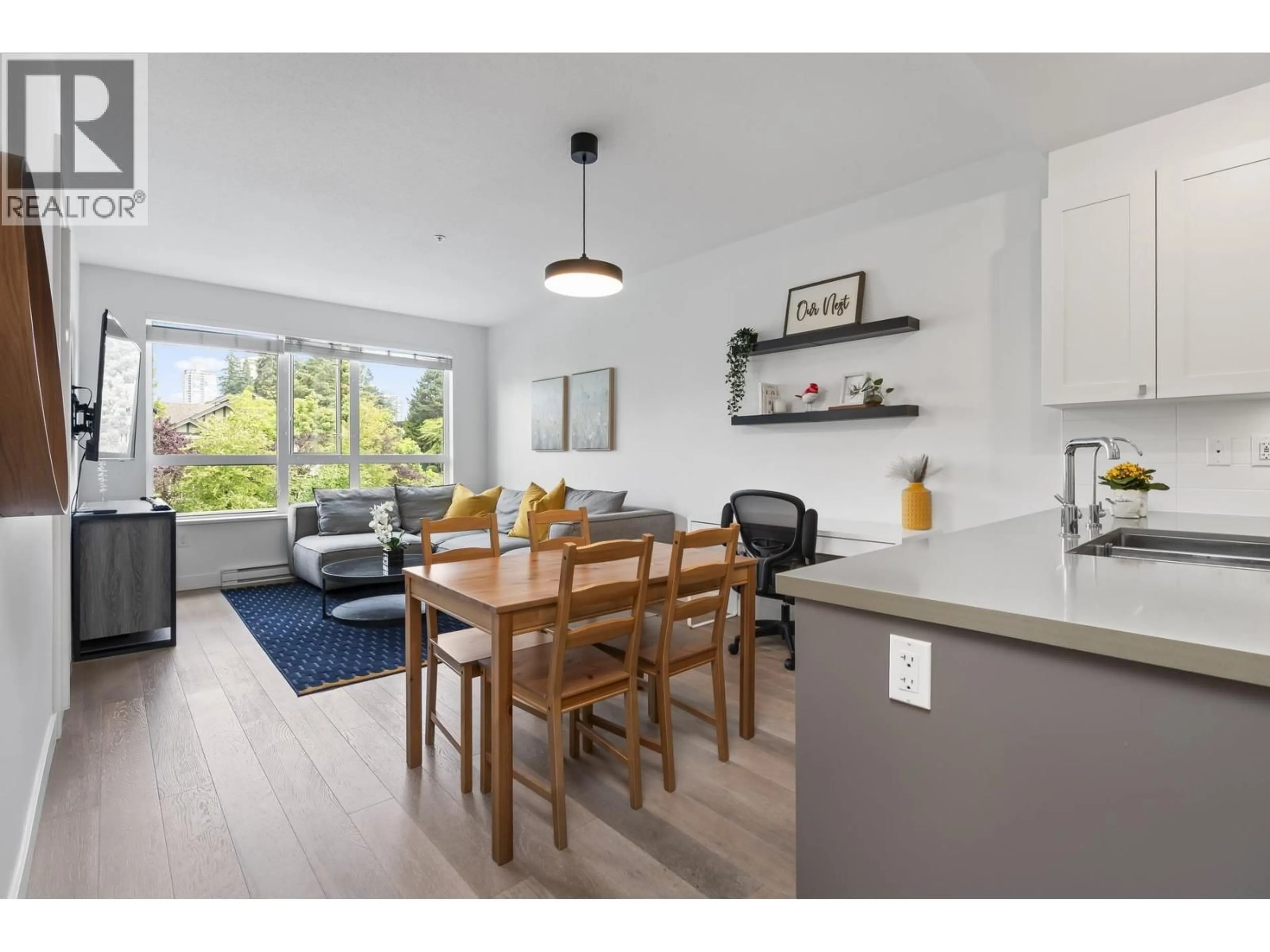 Open concept kitchen, wood/laminate floor for 416 - 3399 NOEL DRIVE, Burnaby British Columbia V3J0G8