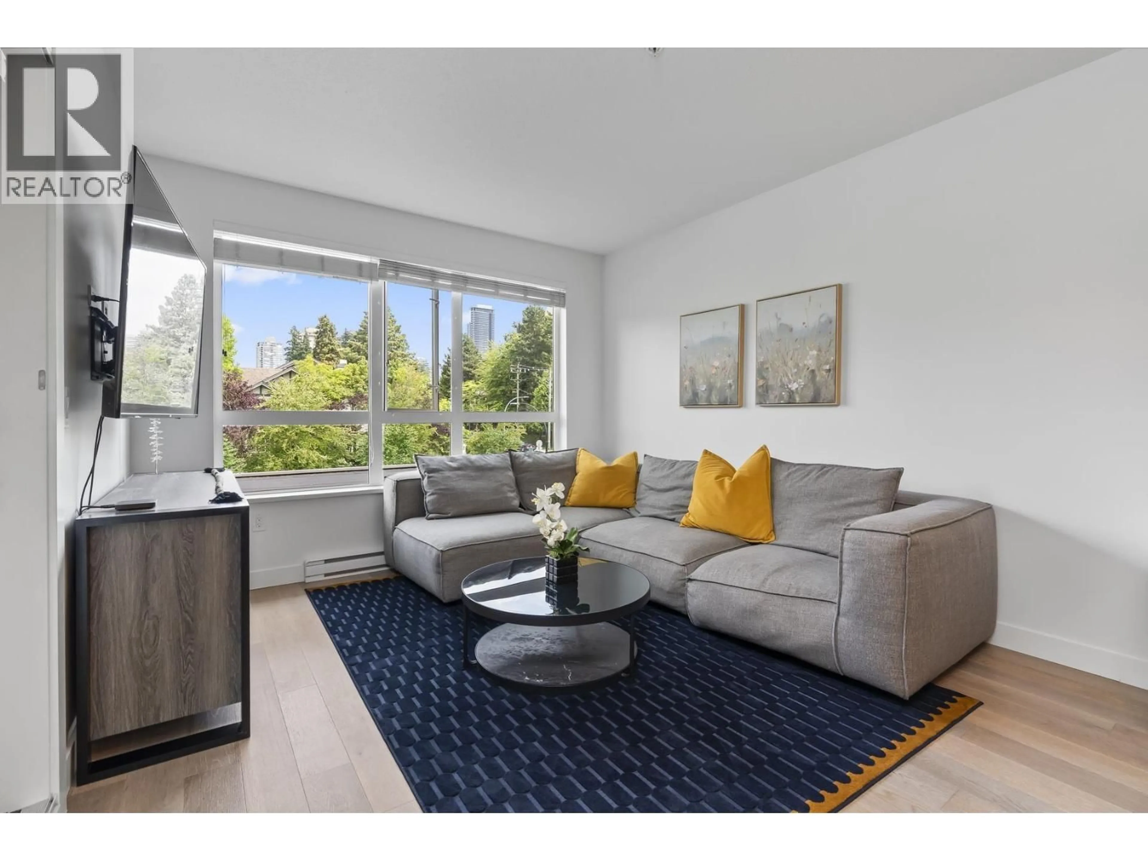 Living room with furniture, unknown for 416 - 3399 NOEL DRIVE, Burnaby British Columbia V3J0G8