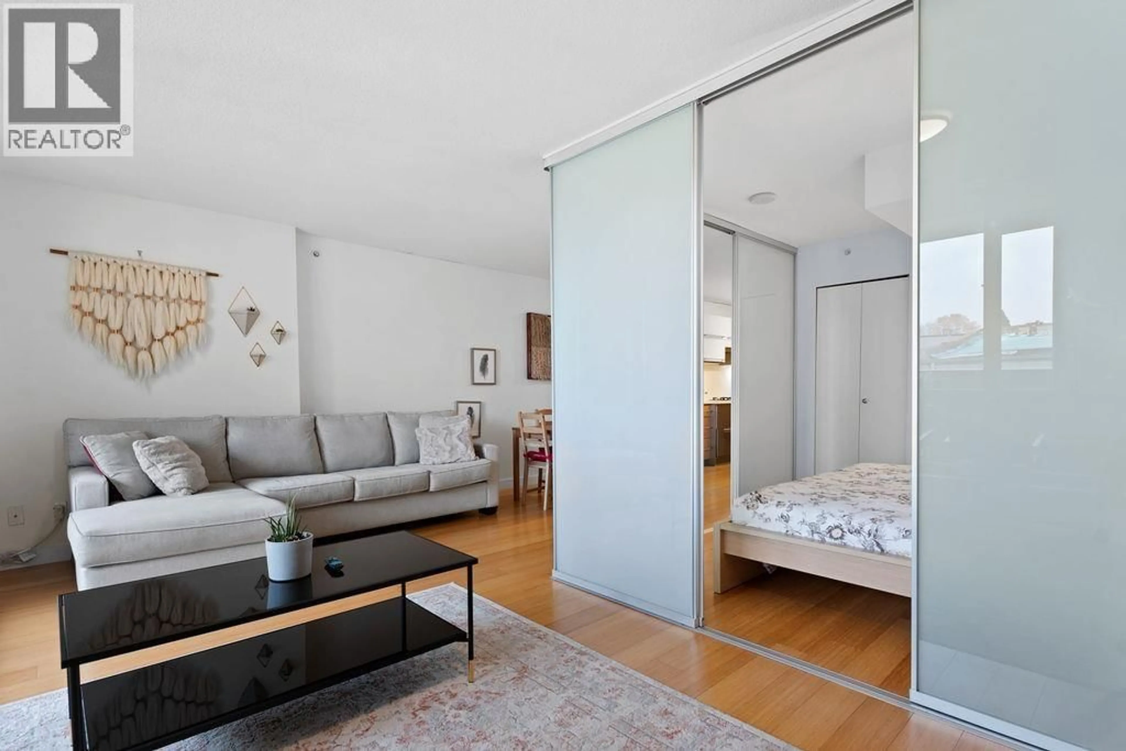 Living room with furniture, unknown for 406 - 718 MAIN STREET, Vancouver British Columbia V6A0B1