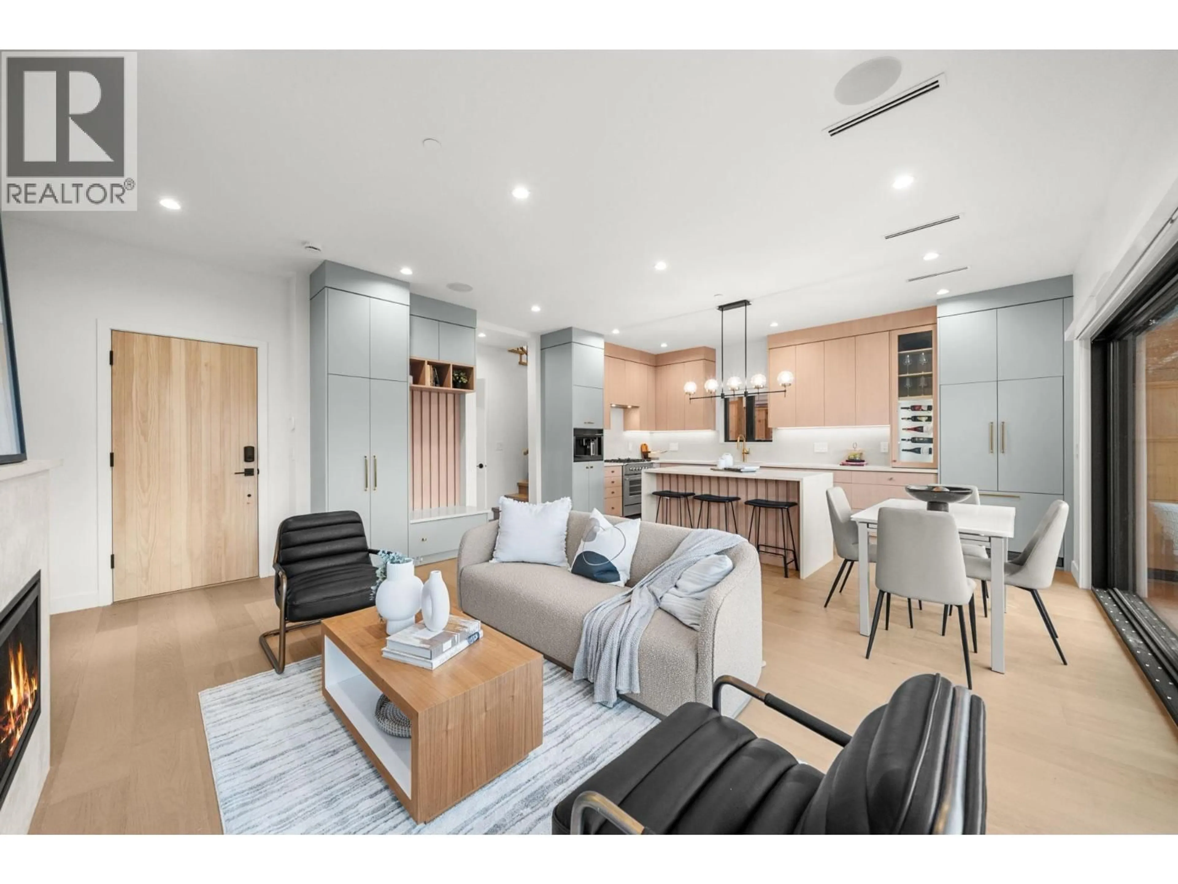 Open concept kitchen, wood/laminate floor for 2 - 2247 PARKER STREET, Vancouver British Columbia V5L2L8