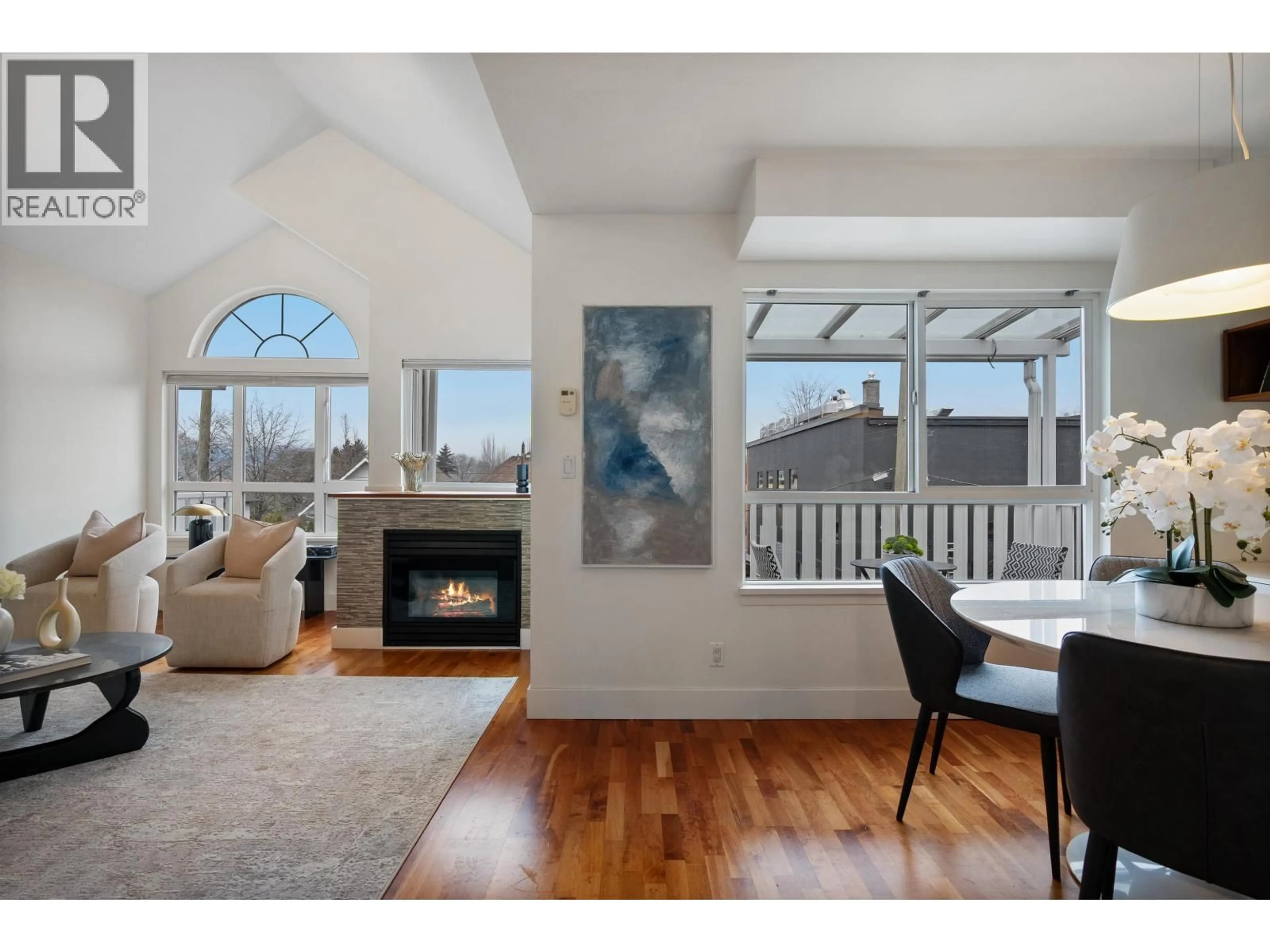 Living room with furniture, wood/laminate floor for 403 - 1623 2ND AVENUE, Vancouver British Columbia V5N1E1