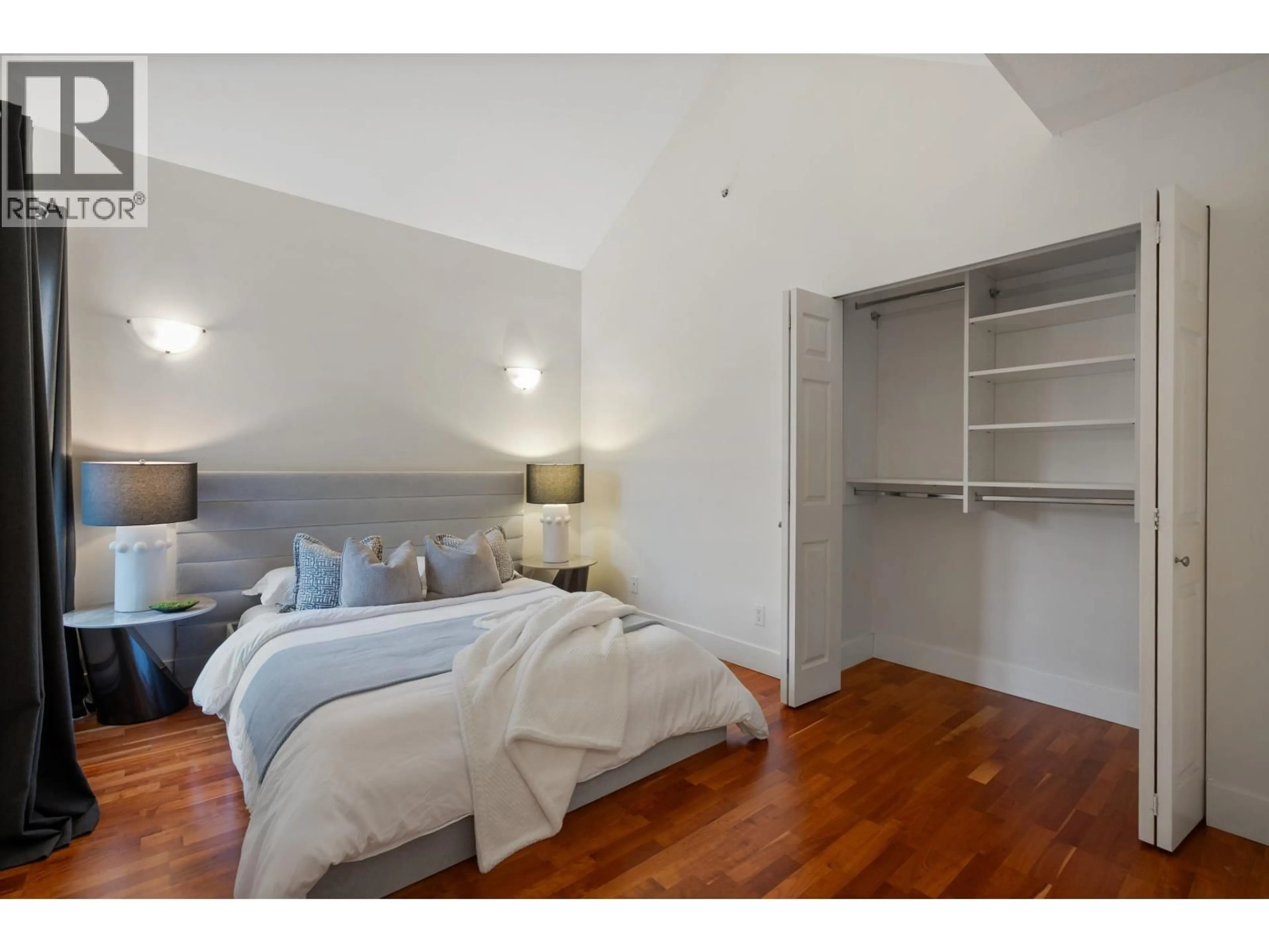 Bedroom with bed, wood/laminate floor for 403 - 1623 2ND AVENUE, Vancouver British Columbia V5N1E1