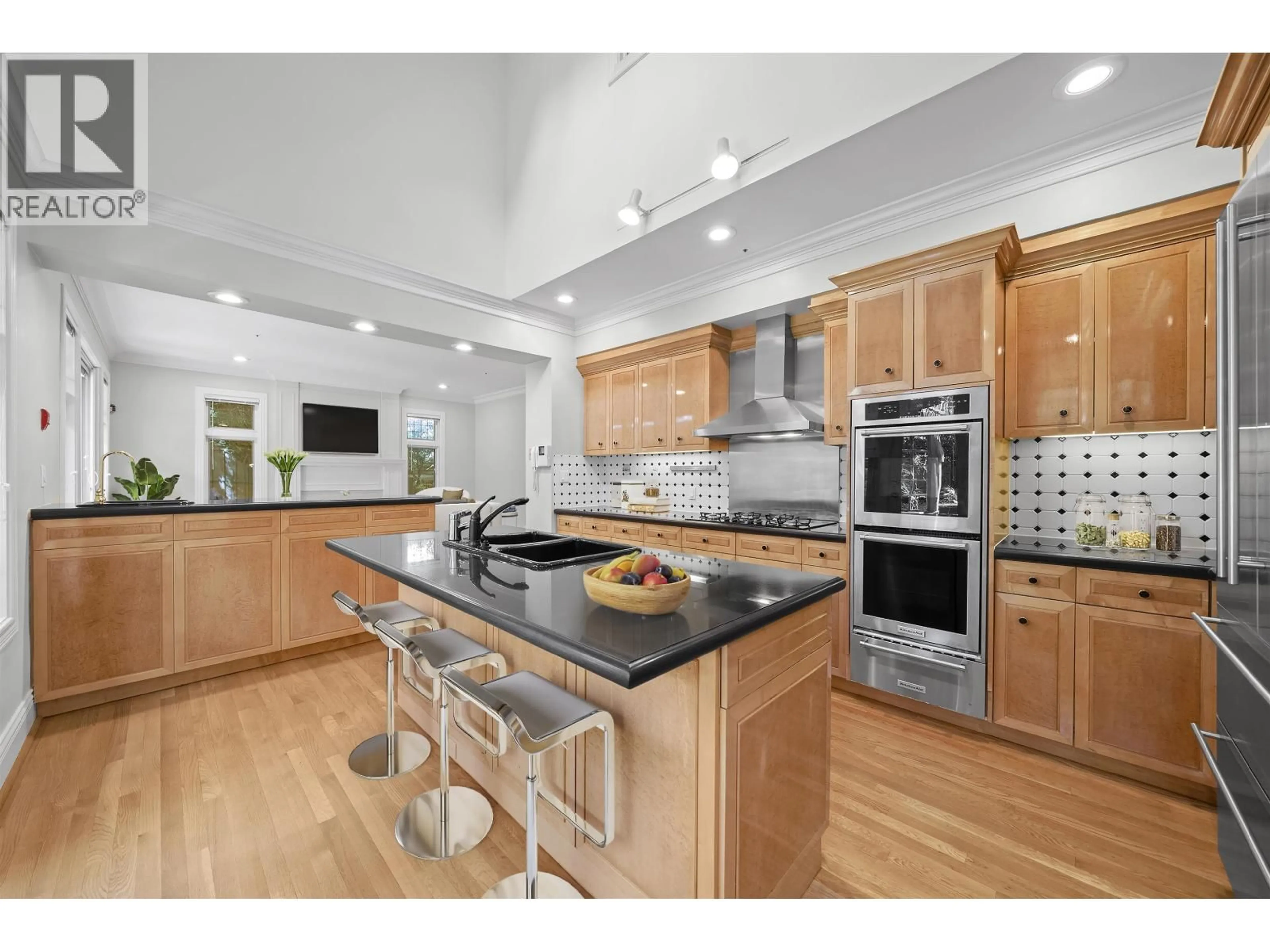 Open concept kitchen, wood/laminate floor for 1323 THE CRESCENT, Vancouver British Columbia V6H1T7