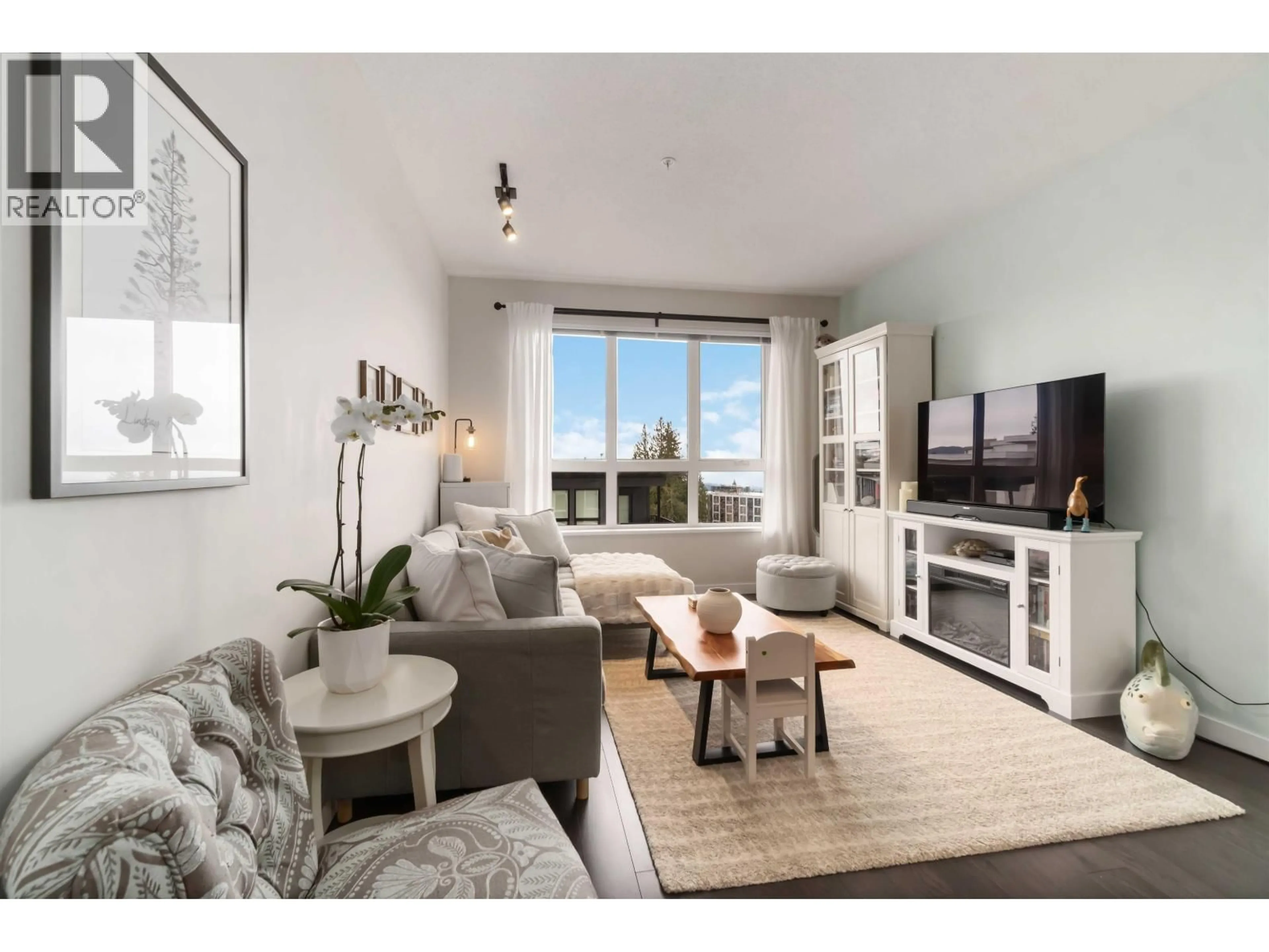 Living room with furniture, unknown for 503 - 9168 SLOPES MEWS, Burnaby British Columbia V5A0E4