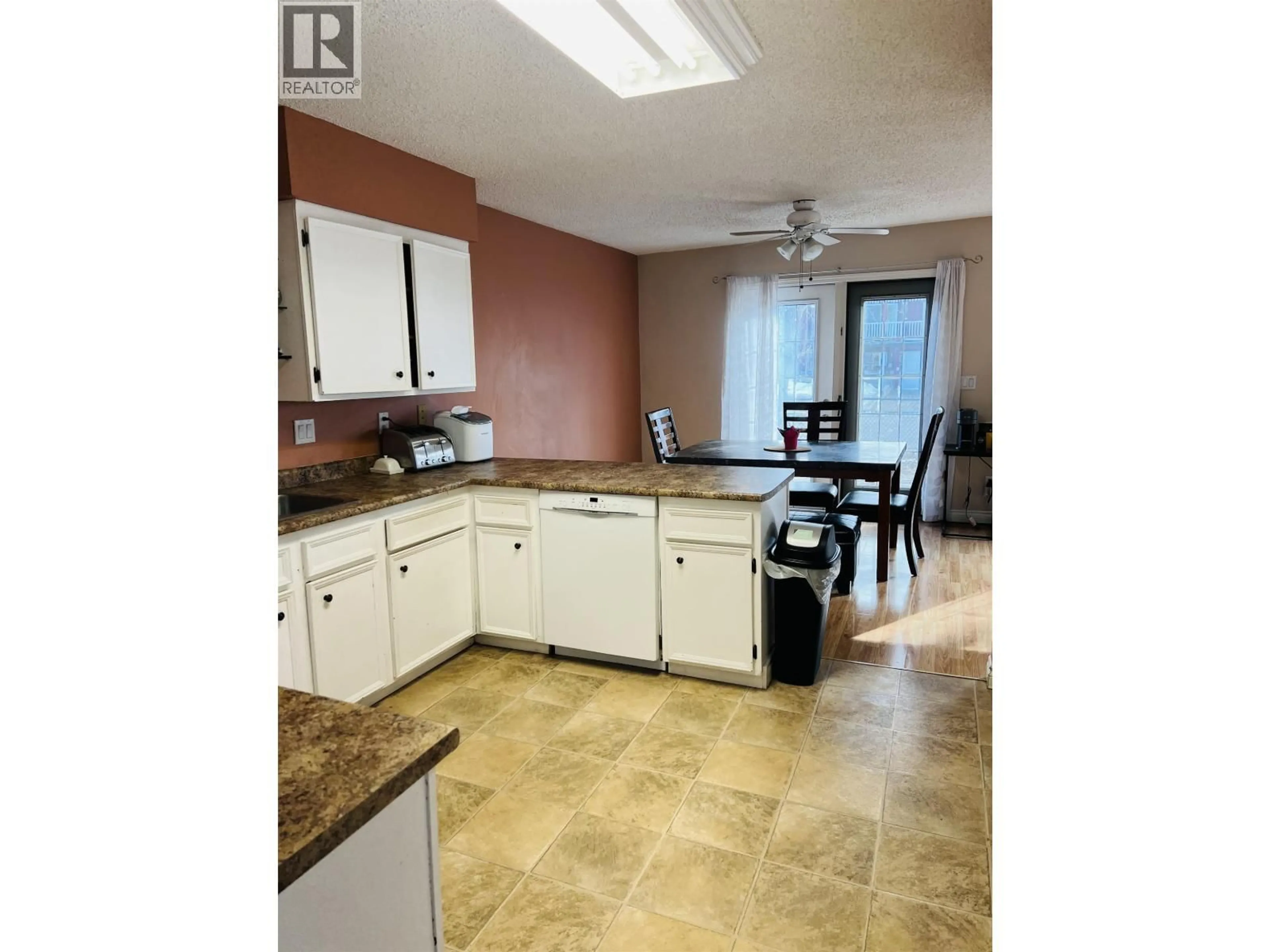 Open concept kitchen, unknown for 10616 102 STREET, Fort St. John British Columbia V1J4X7