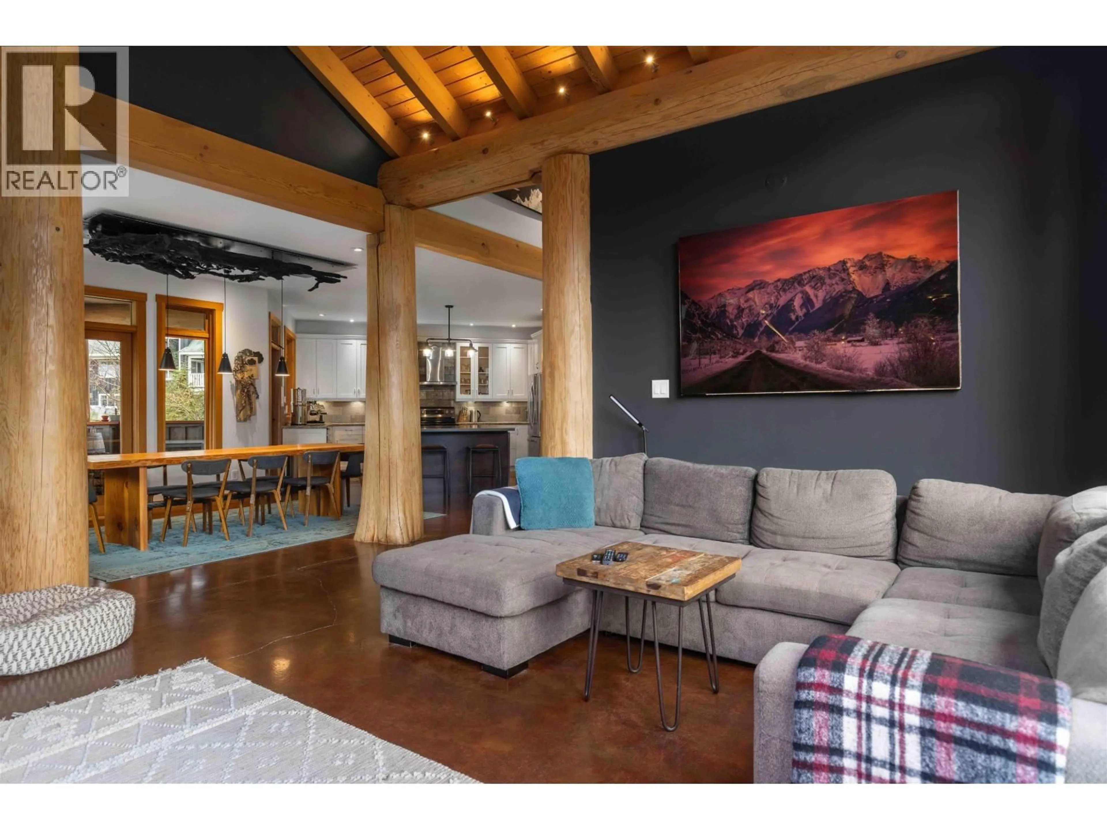 Living room with furniture, wood/laminate floor for 7703 PEMBERTON PORTAGE ROAD, Pemberton British Columbia V0N2L0