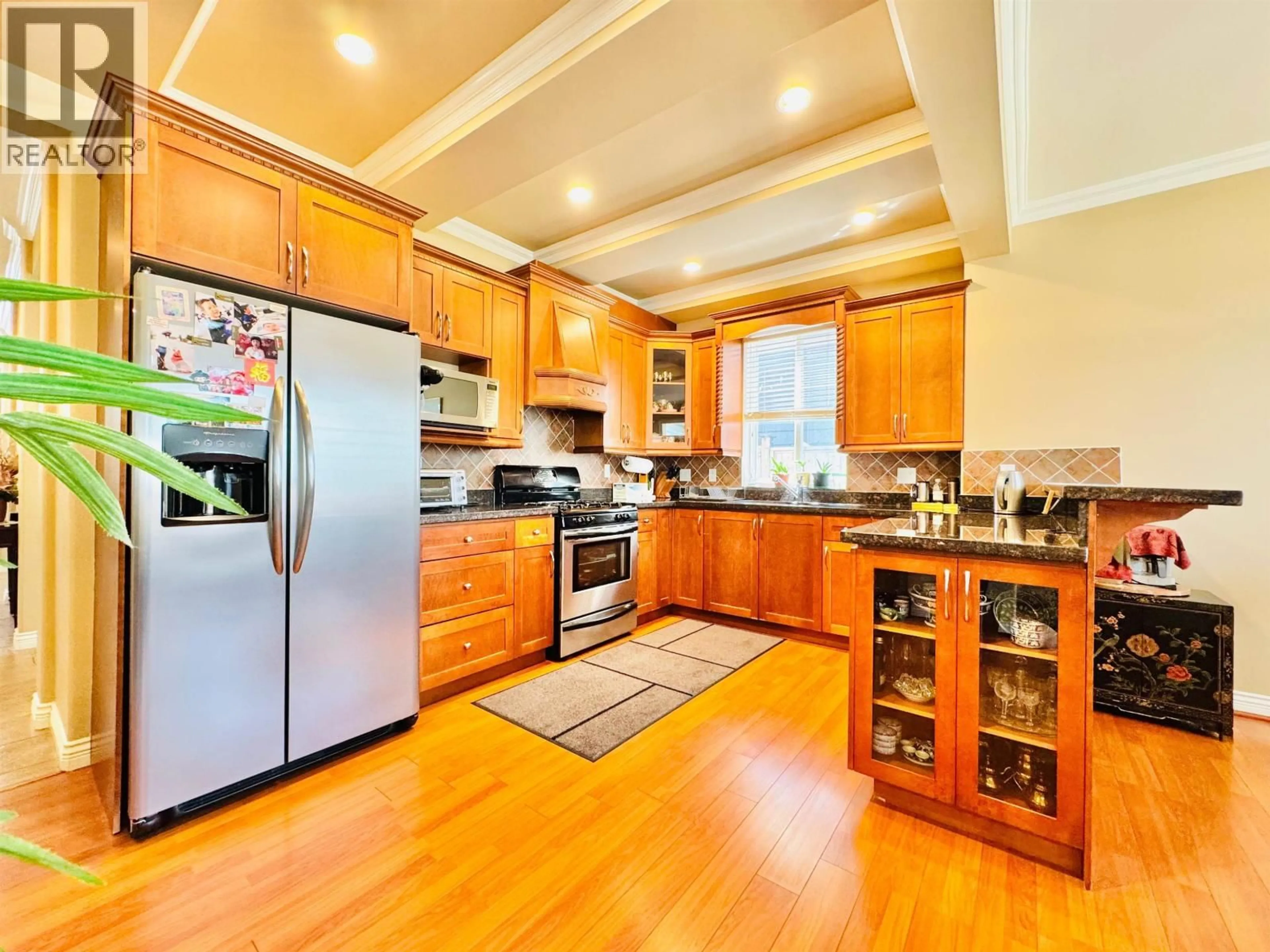 Open concept kitchen, wood/laminate floor for 6039 46A AVENUE, Delta British Columbia V4K5G2