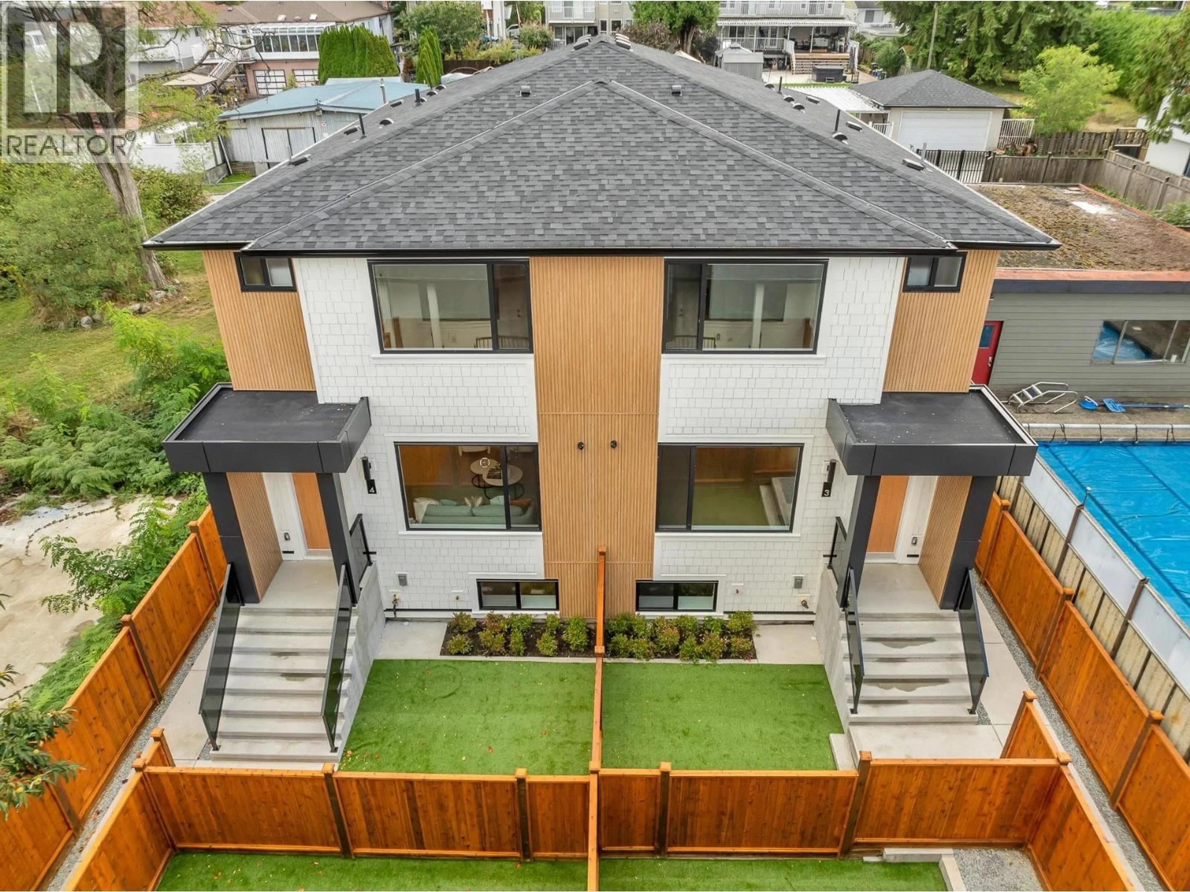A pic from outside/outdoor area/front of a property/back of a property/a pic from drone, mountain view for 4 - 7750 MAYFIELD STREET, Burnaby British Columbia V5E2J6