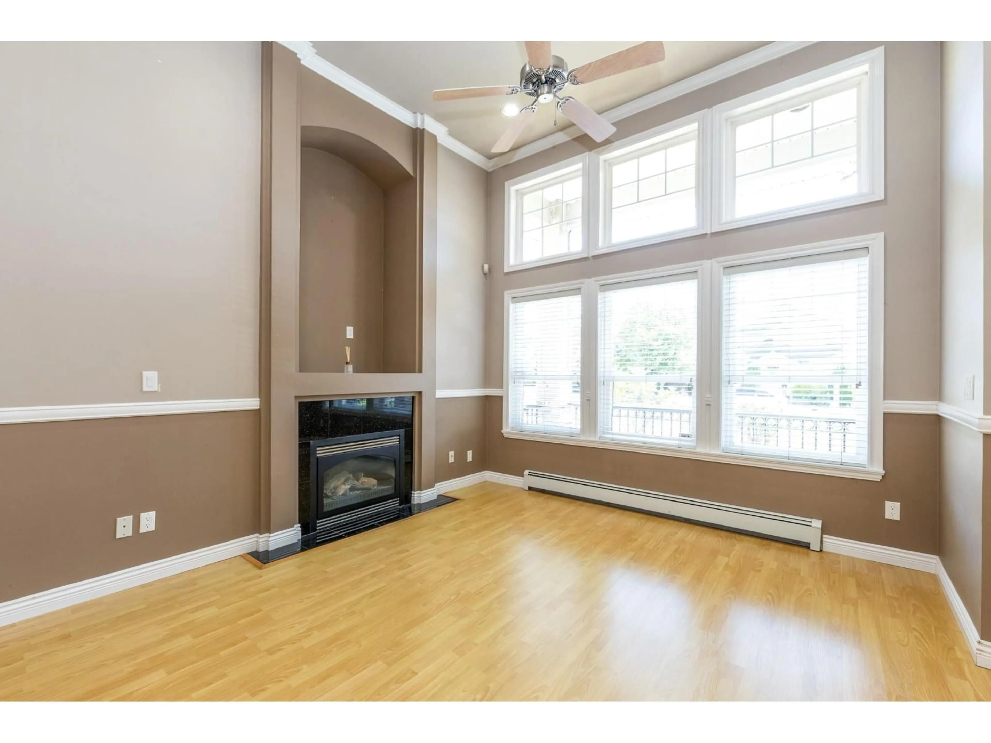 Living room with furniture, wood/laminate floor for 5639 148 STREET, Surrey British Columbia V3S3B7