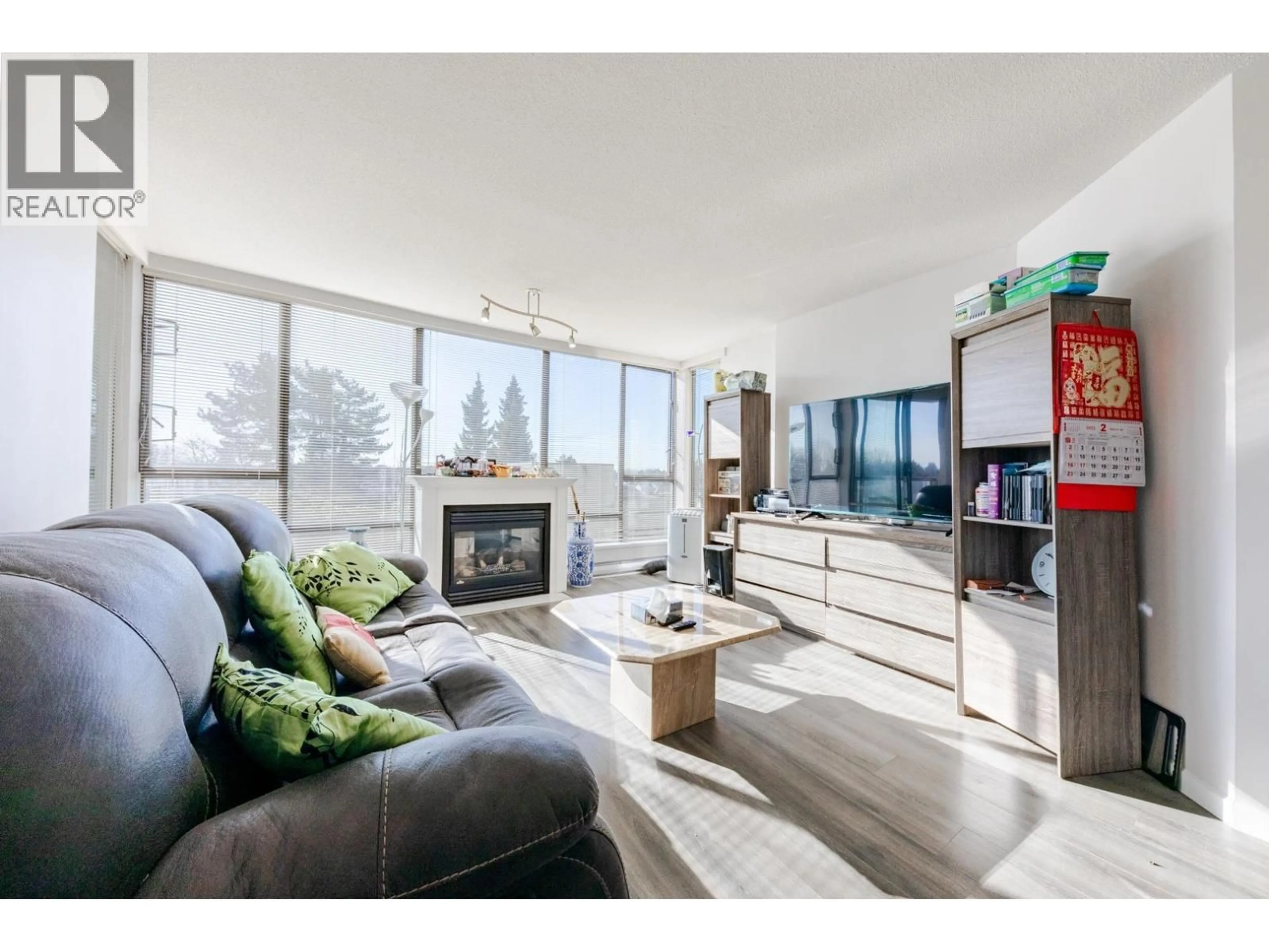 Living room with furniture, wood/laminate floor for 708 - 8180 GRANVILLE AVENUE, Richmond British Columbia V6Y4G1