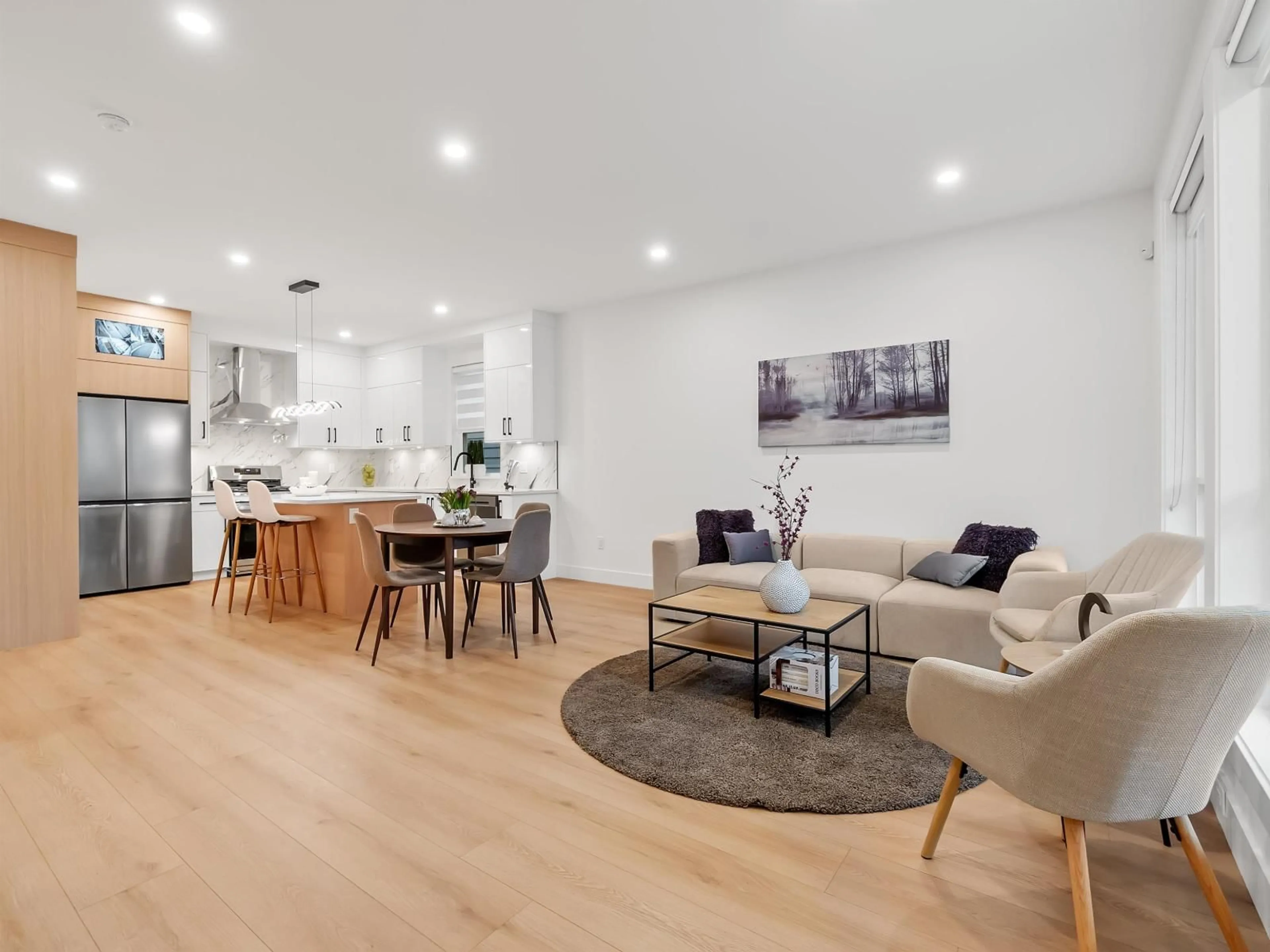 Living room with furniture, wood/laminate floor for 102 - 16693 16 AVENUE, Surrey British Columbia V3X9X7