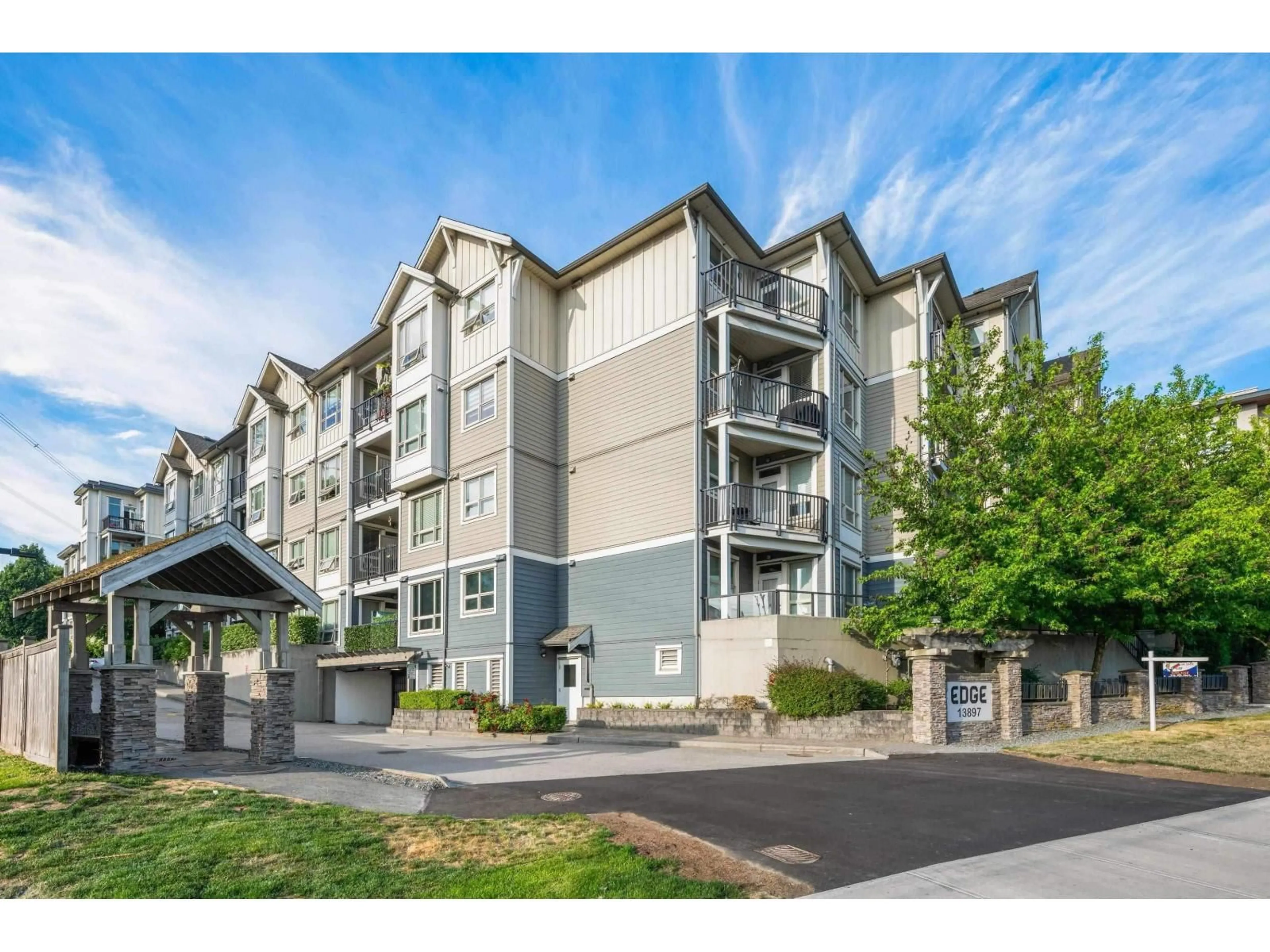 A pic from outside/outdoor area/front of a property/back of a property/a pic from drone, mountain view for 223 - 13897 FRASER HIGHWAY, Surrey British Columbia V3T0G8