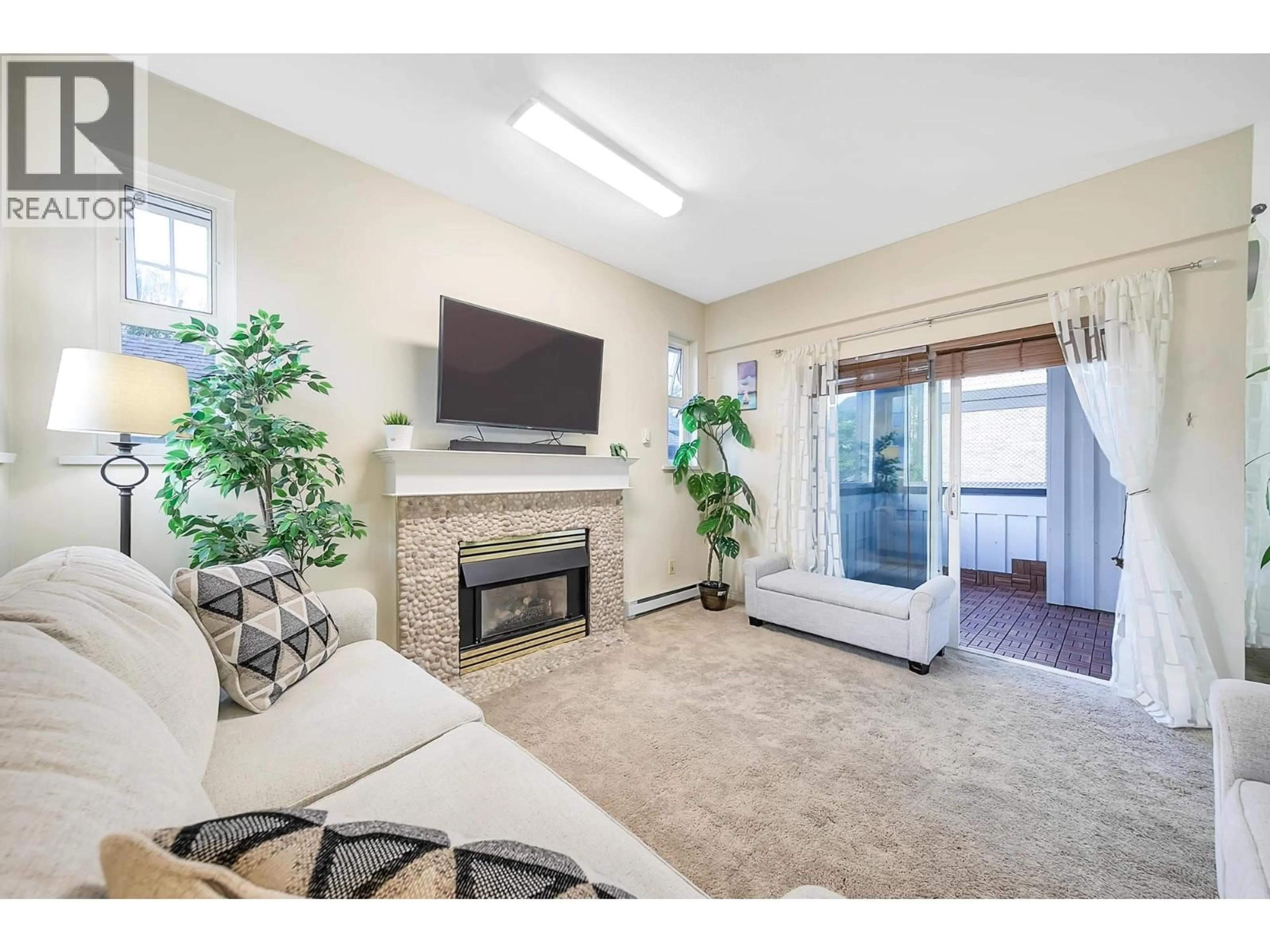 Living room with furniture, unknown for 202 - 83 STAR CRESCENT, New Westminster British Columbia V3M6X8