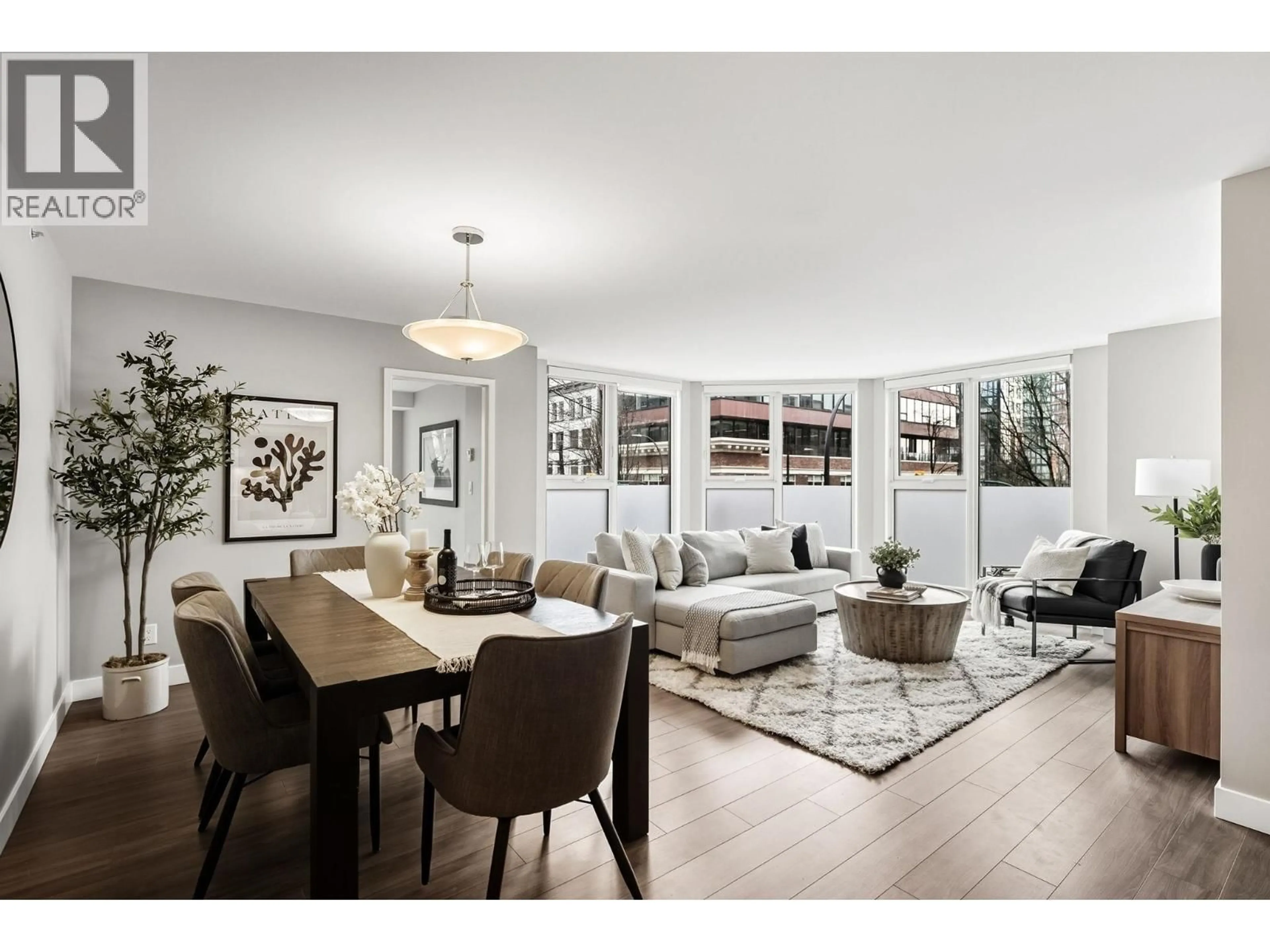Living room with furniture, wood/laminate floor for 202 - 1323 HOMER STREET, Vancouver British Columbia V6B5T1