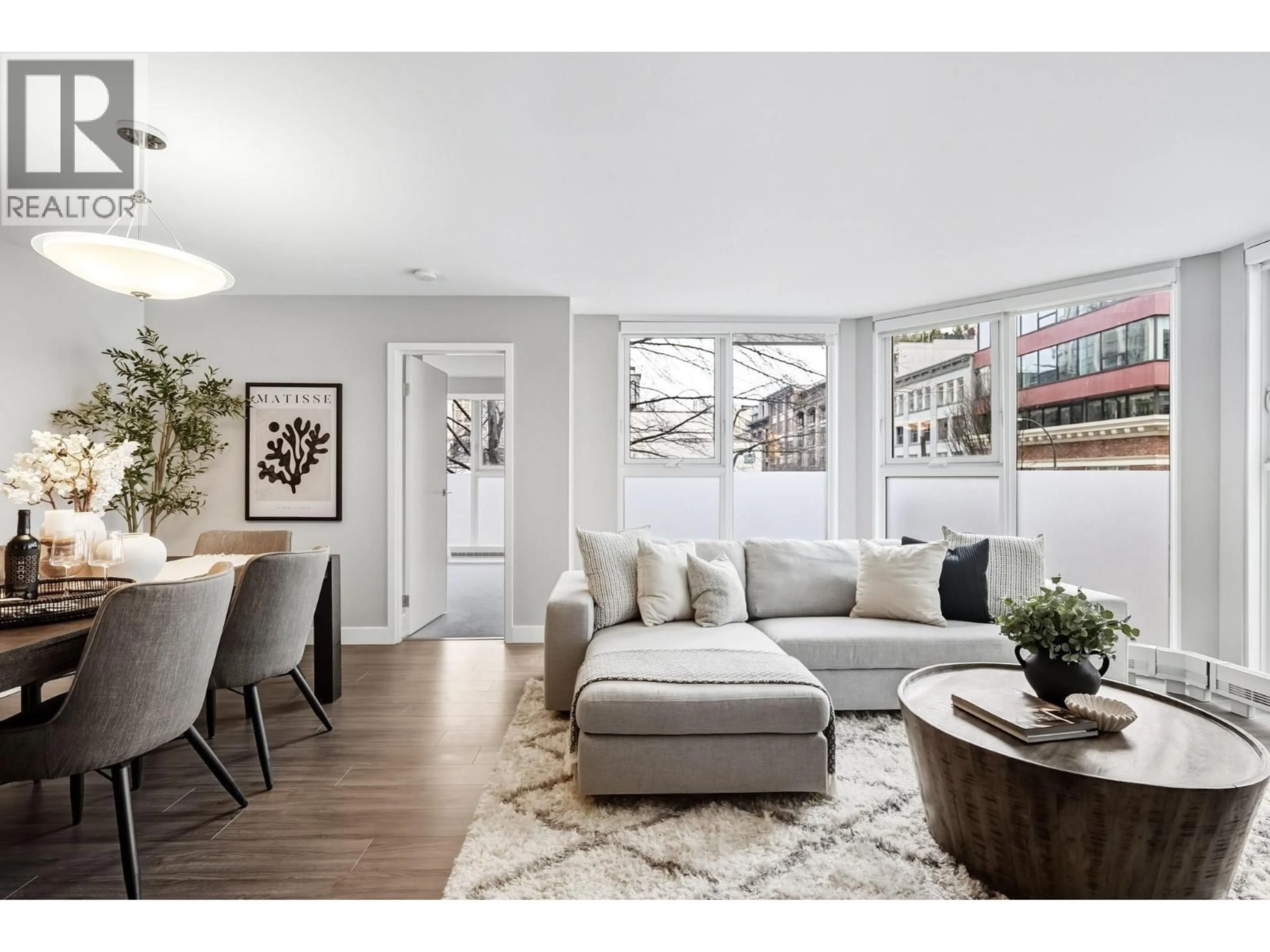 Living room with furniture, wood/laminate floor for 202 - 1323 HOMER STREET, Vancouver British Columbia V6B5T1