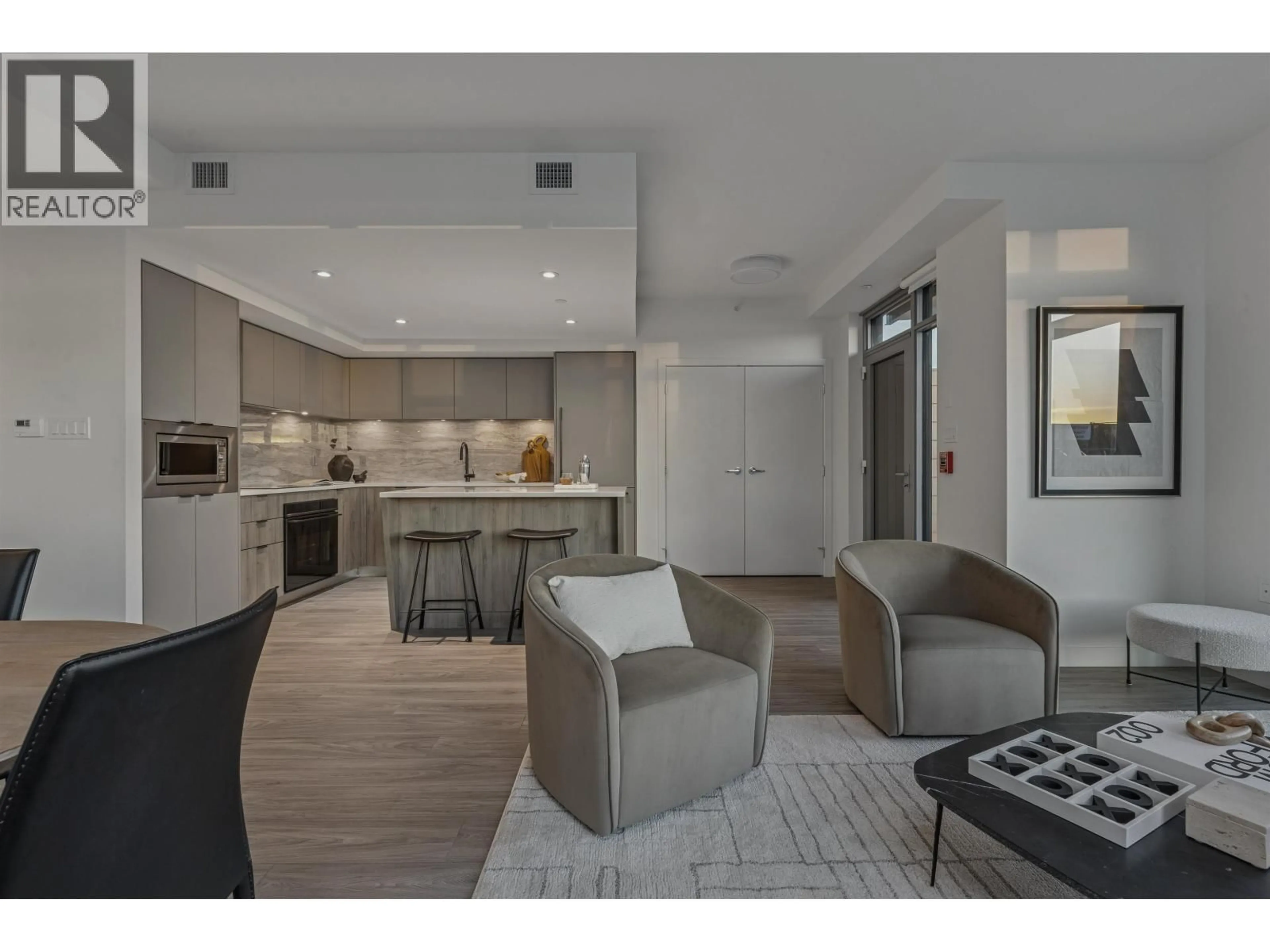 Open concept kitchen, unknown for 112 - 755 HARBOURSIDE DRIVE, North Vancouver British Columbia V7P0G1