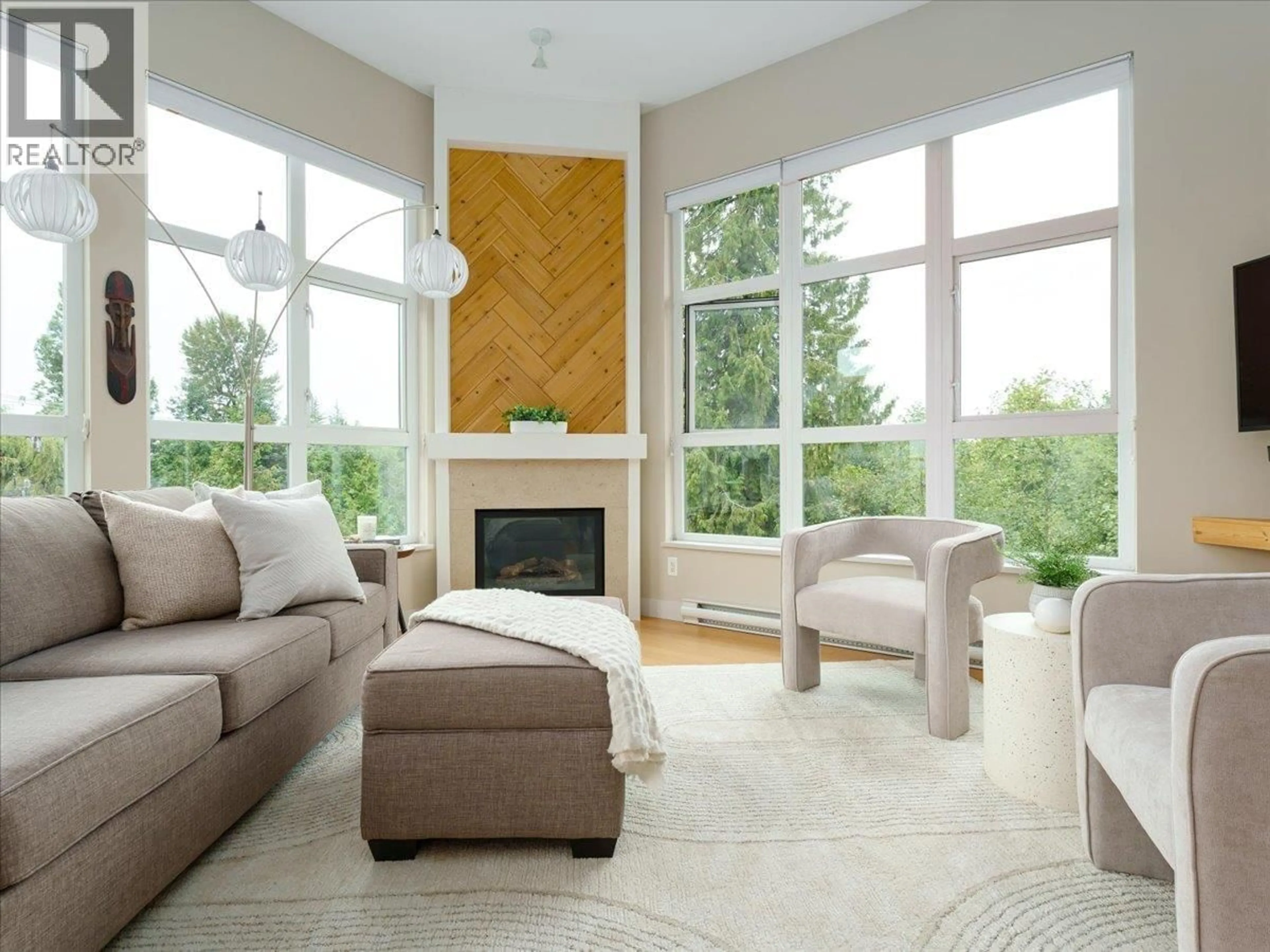 Living room with furniture, unknown for 402 - 3732 MT SEYMOUR PARKWAY, North Vancouver British Columbia V7G1C3