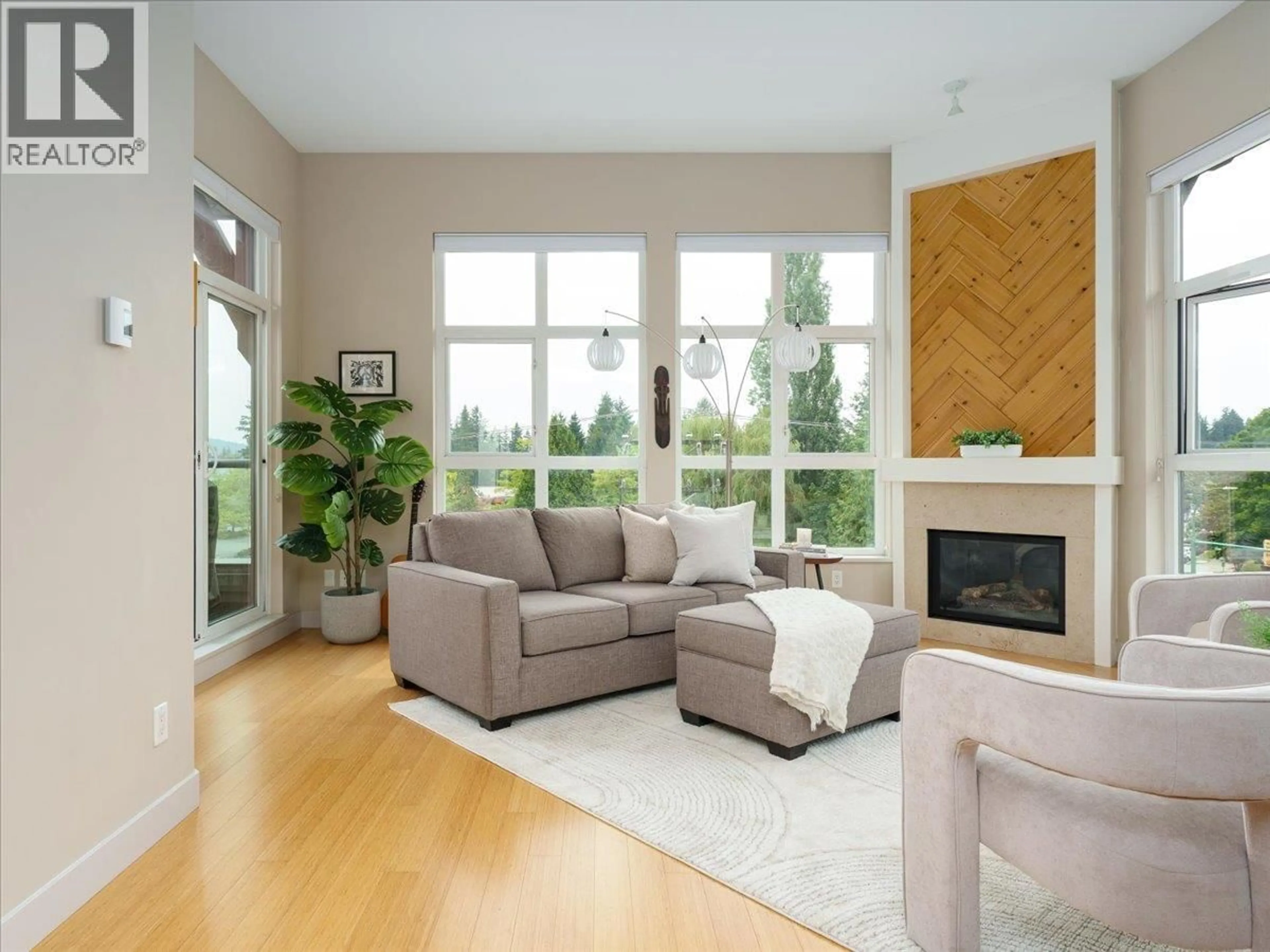 Living room with furniture, unknown for 402 - 3732 MT SEYMOUR PARKWAY, North Vancouver British Columbia V7G1C3