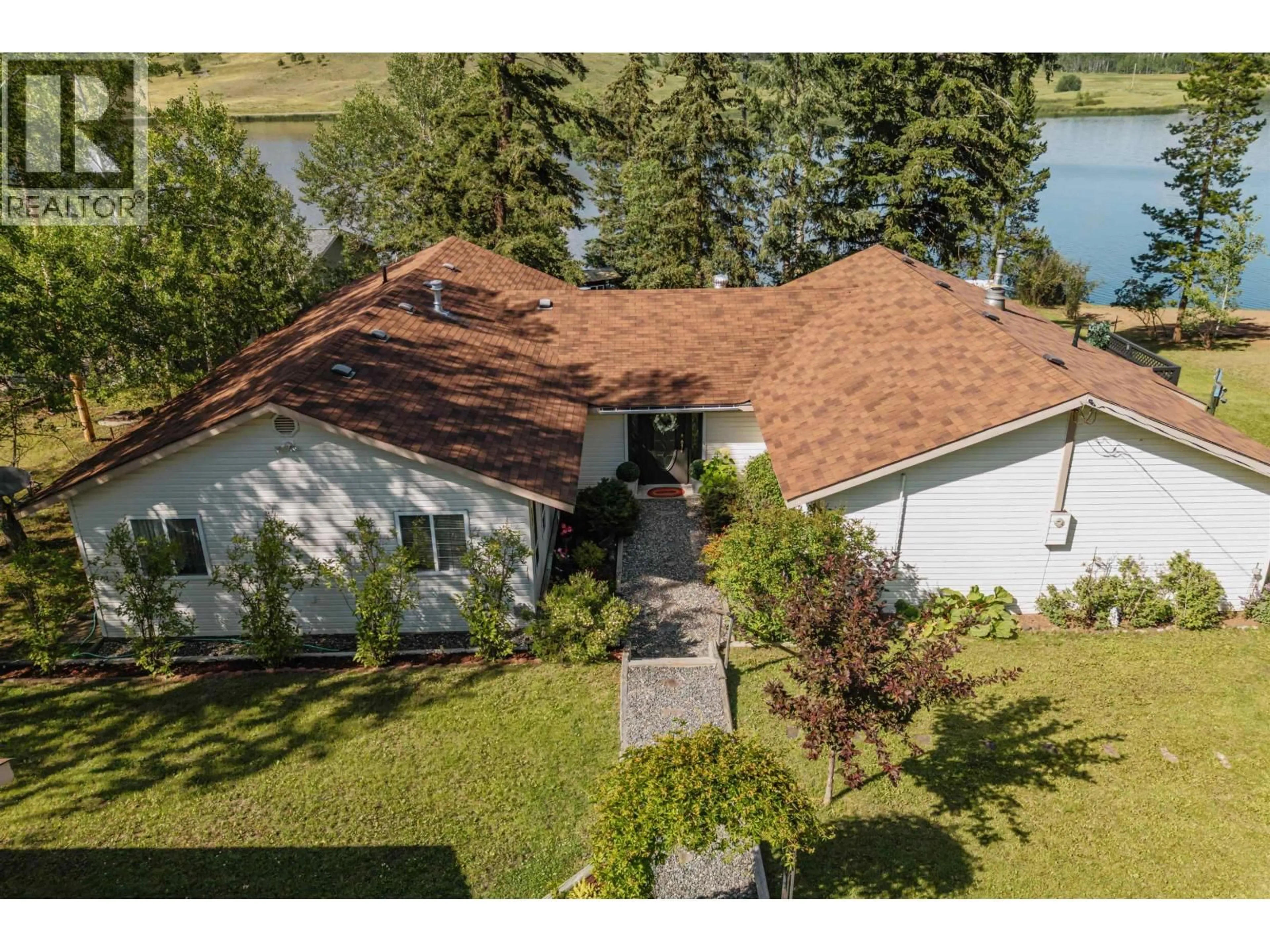 A pic from outside/outdoor area/front of a property/back of a property/a pic from drone, water/lake/river/ocean view for 5151 WATSON LAKE ROAD, 100 Mile House British Columbia V0K2E1