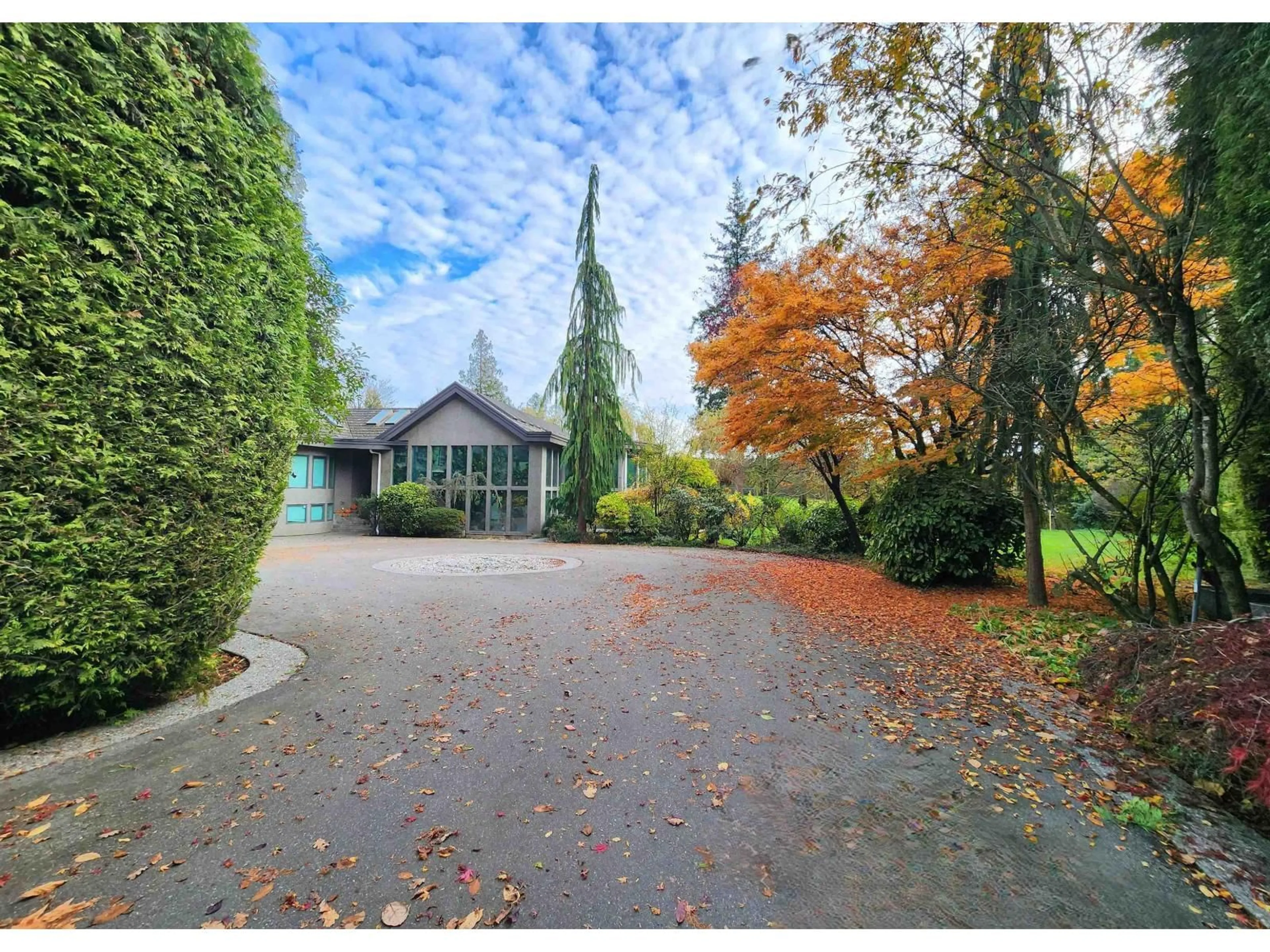 A pic from outside/outdoor area/front of a property/back of a property/a pic from drone, street for 3130 248 STREET, Langley British Columbia V3A1Z1