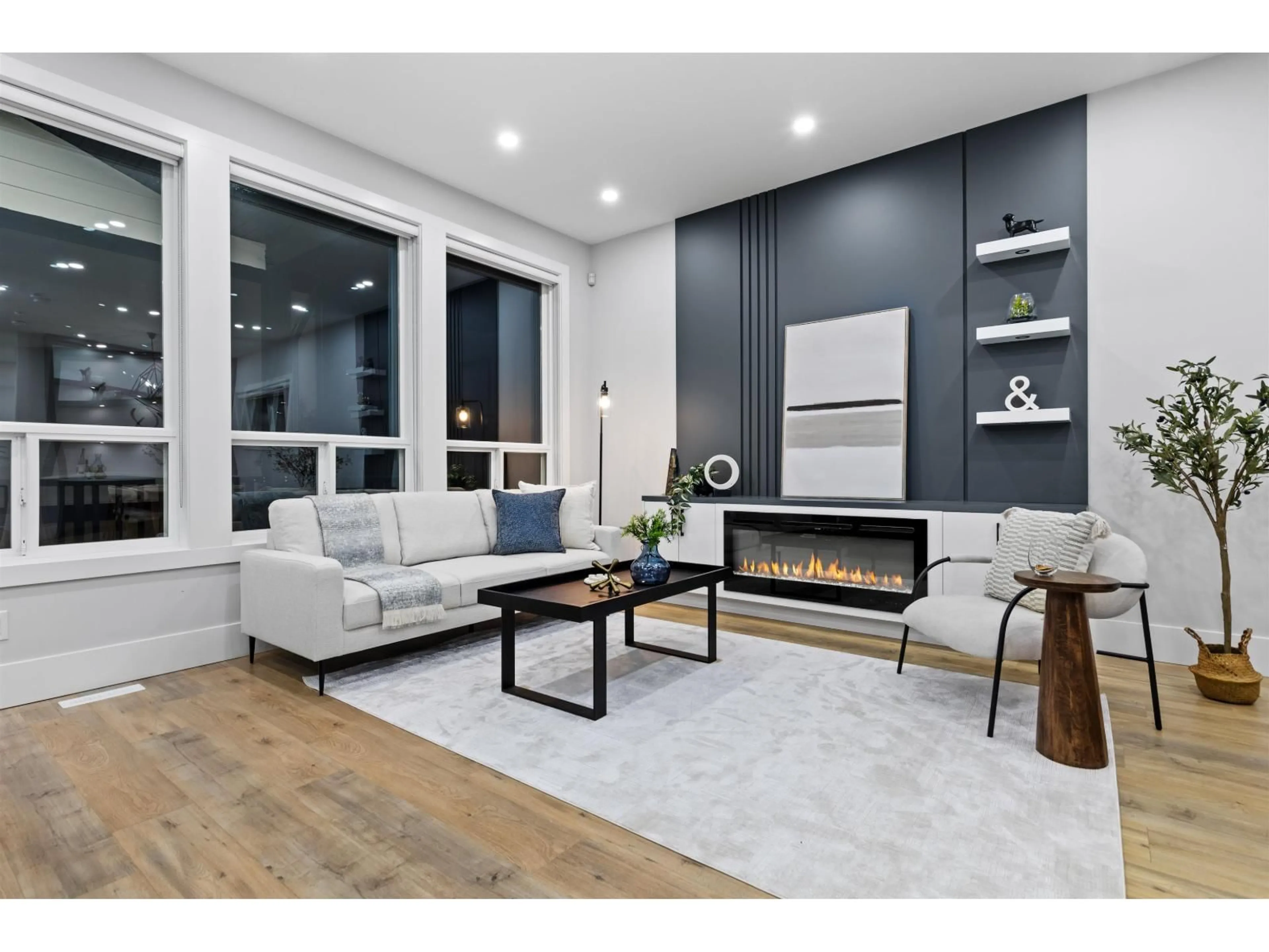 Living room with furniture, wood/laminate floor for 16717 15A AVENUE, Surrey British Columbia V3S9X7