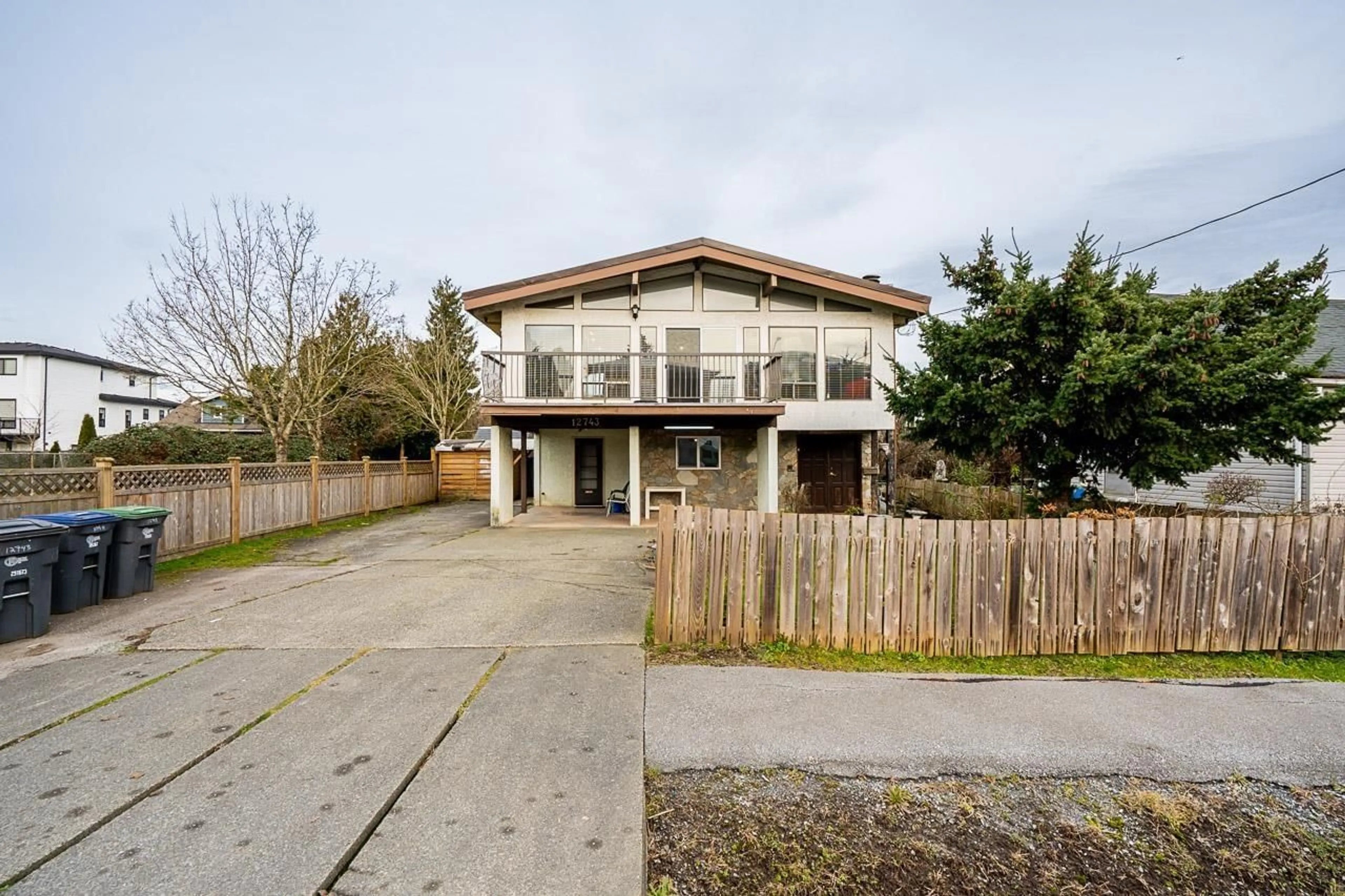 A pic from outside/outdoor area/front of a property/back of a property/a pic from drone, street for 12743 114 AVENUE, Surrey British Columbia V3V3P2