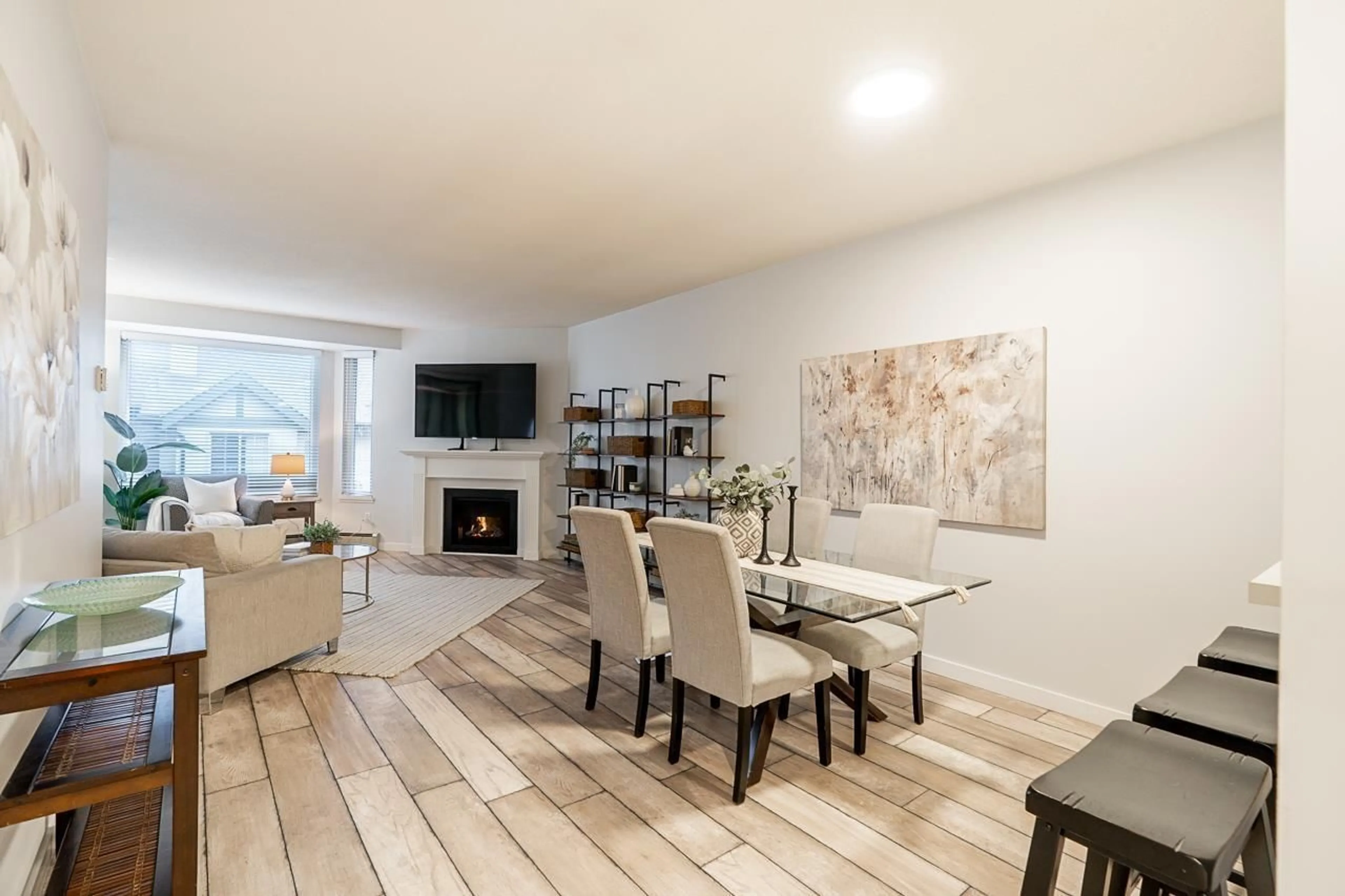 Living room with furniture, wood/laminate floor for 312 - 15300 17 AVENUE, Surrey British Columbia V4A8Y6