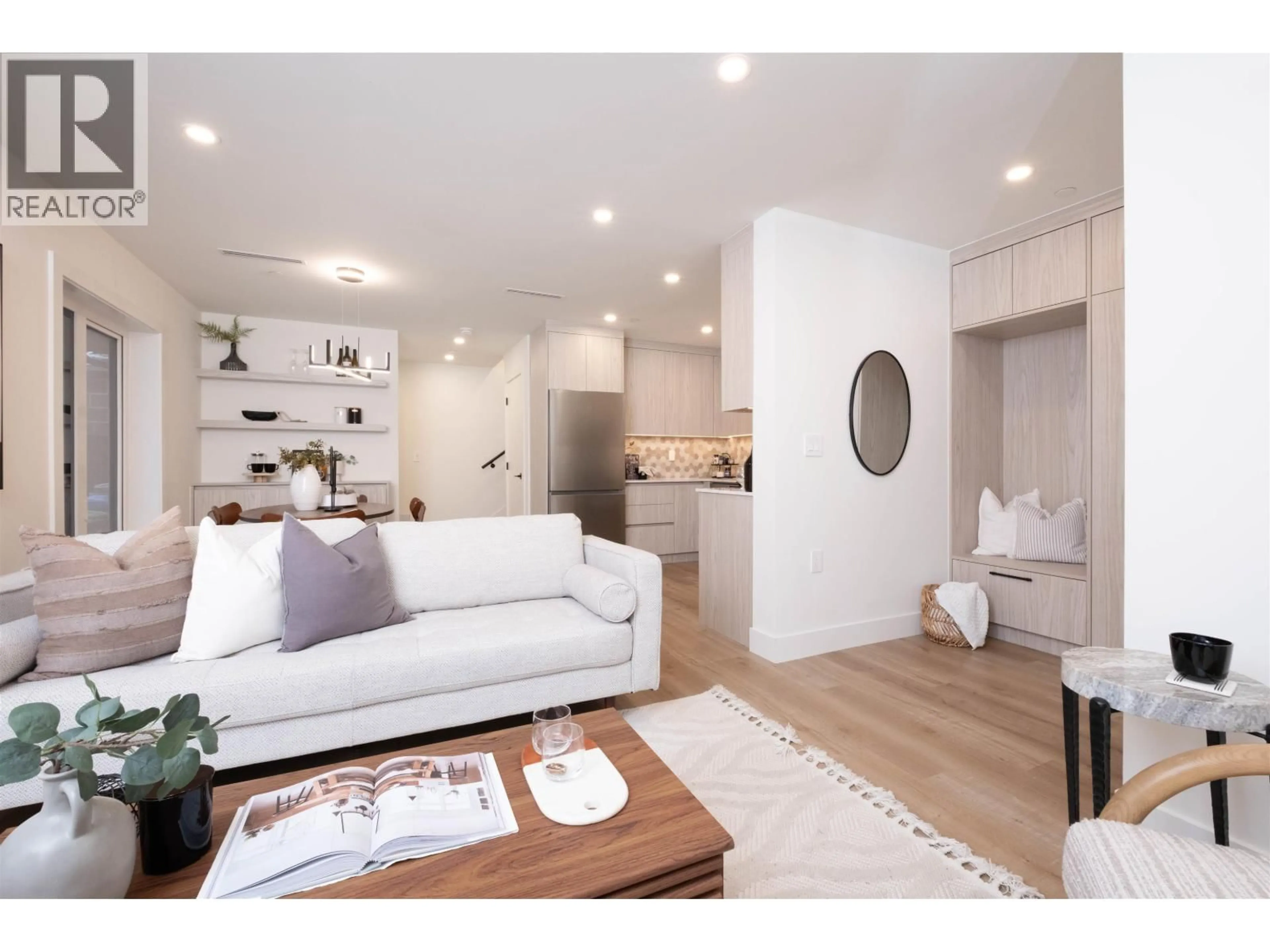 Living room with furniture, wood/laminate floor for 2665 PENDER STREET, Vancouver British Columbia V5K2B6