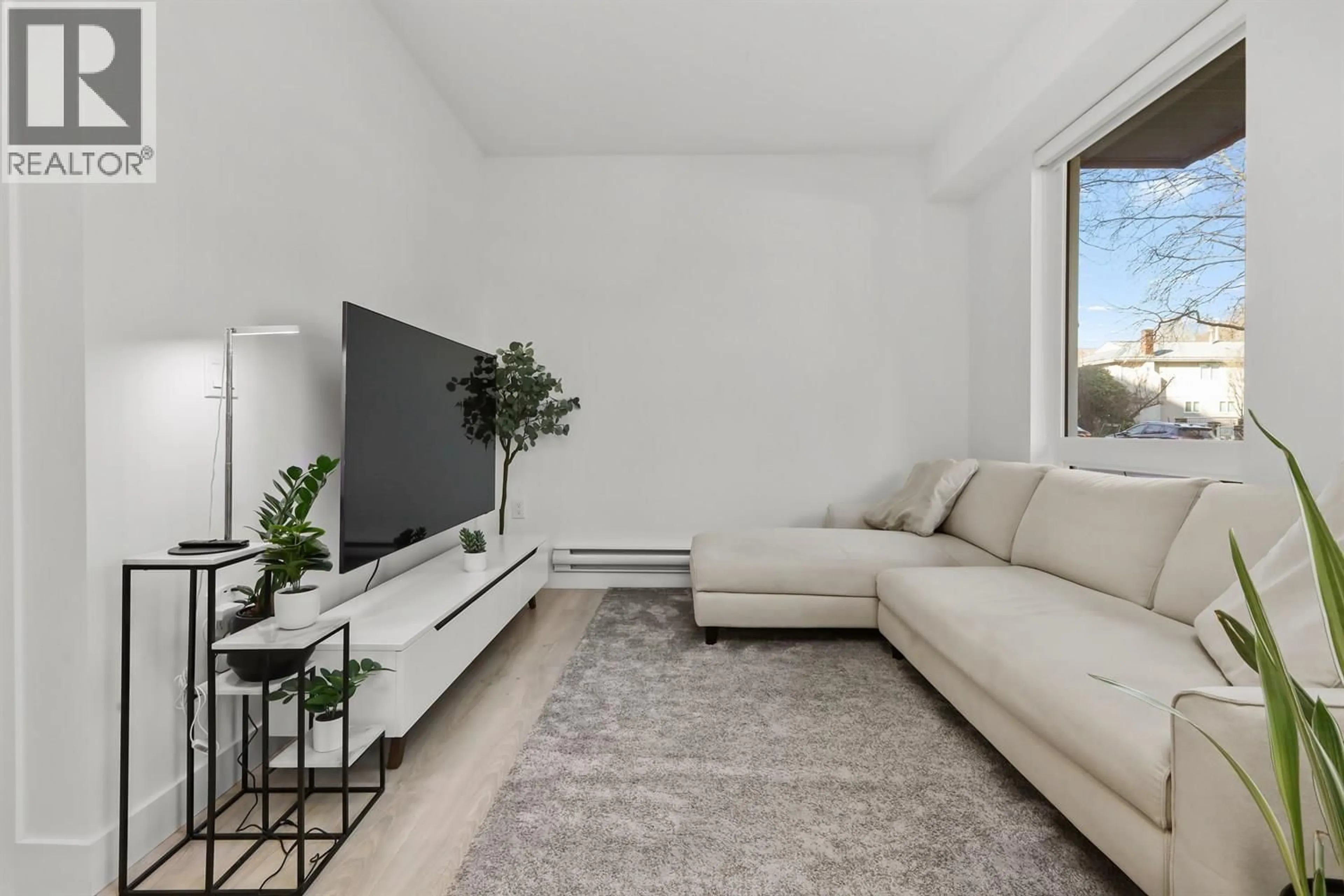 Living room with furniture, unknown for 101 - 2688 DUKE STREET, Vancouver British Columbia V5R4S9