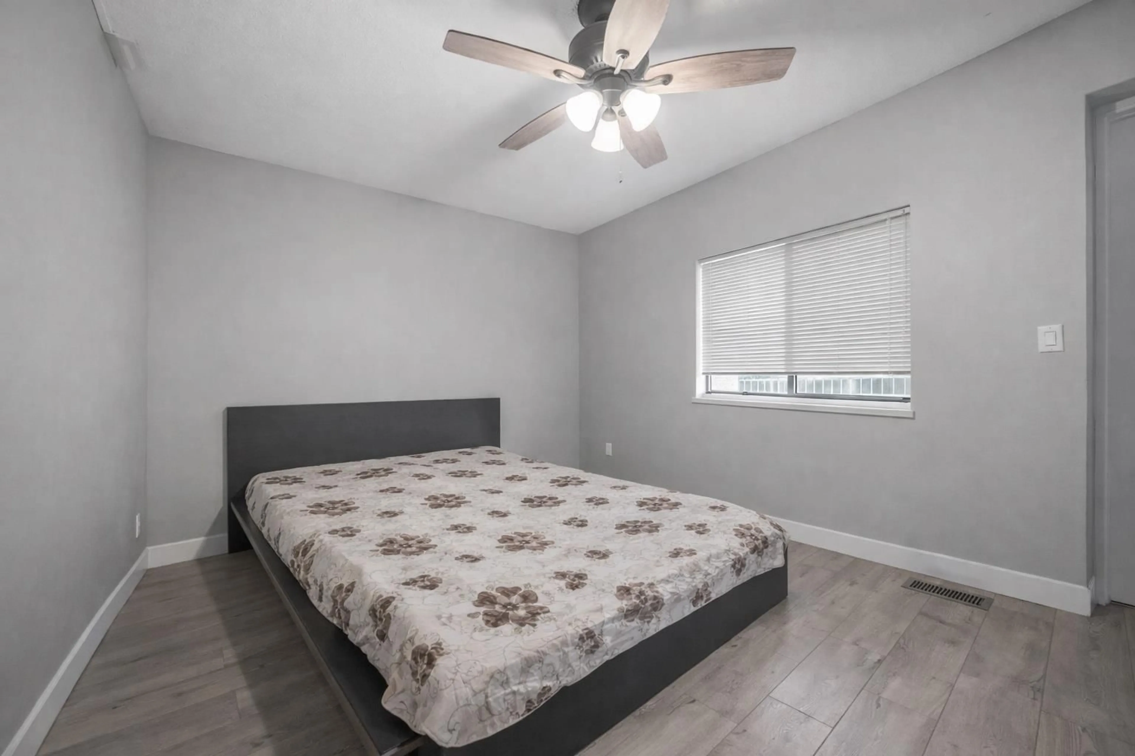 Bedroom with bed, wood/laminate floor for 13131 92 AVENUE, Surrey British Columbia V3V1H5