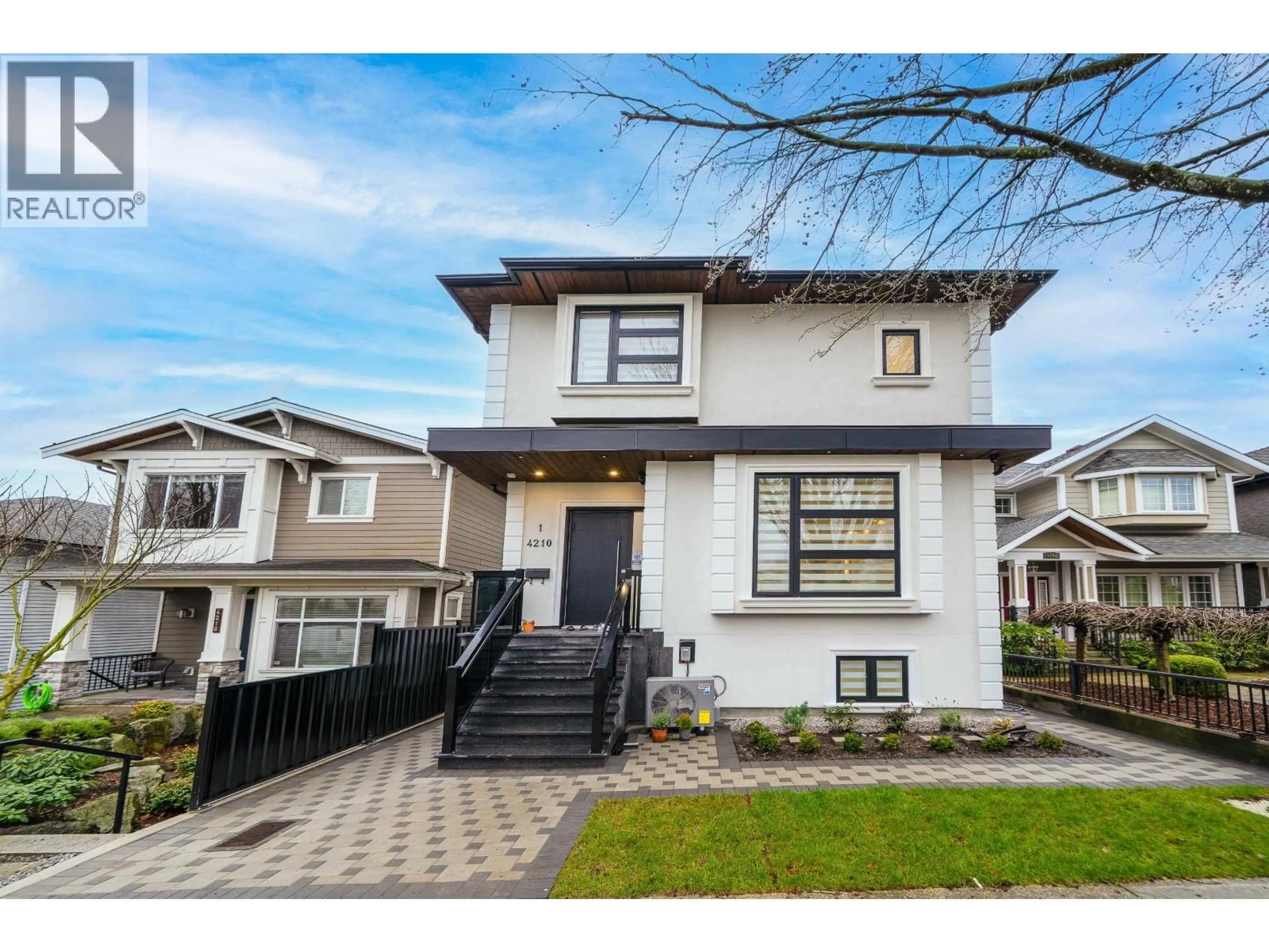 Home with vinyl exterior material, street for 1 - 4210 UNION STREET, Burnaby British Columbia V5C2X4