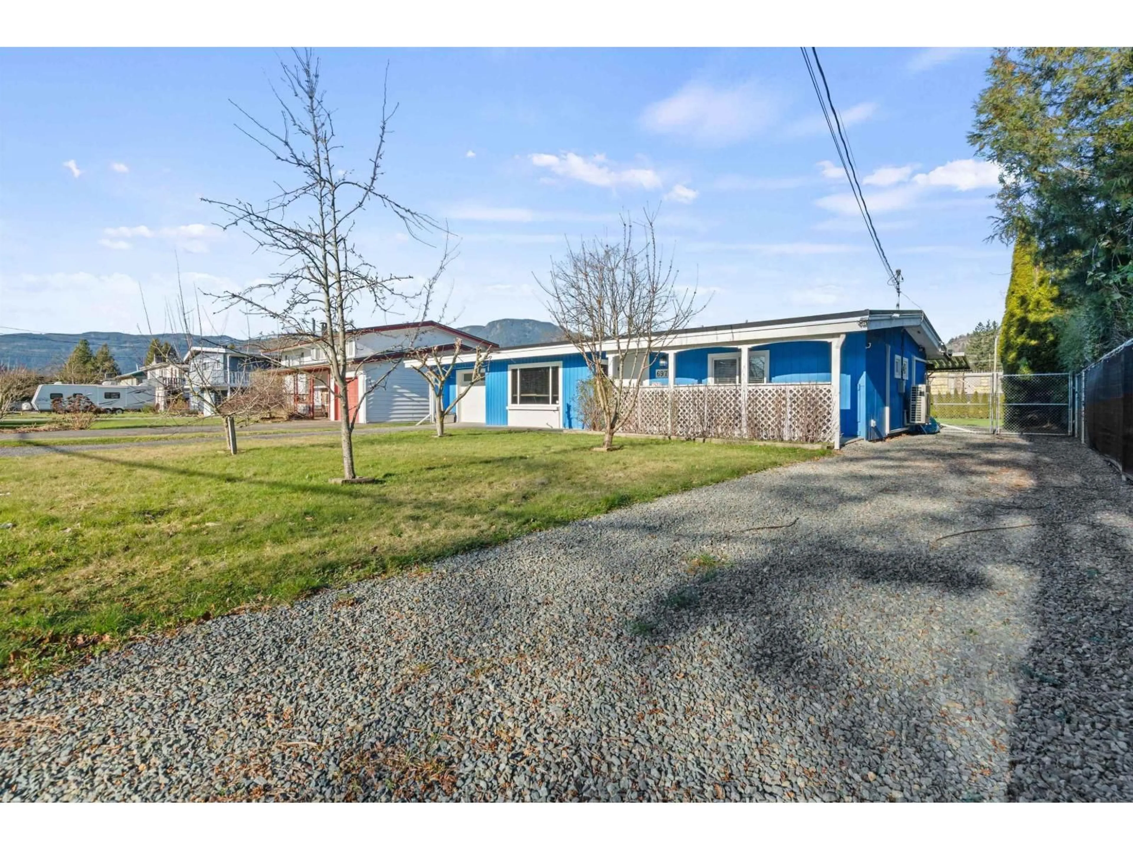 A pic from outside/outdoor area/front of a property/back of a property/a pic from drone, street for 6979 FRASER DRIVE, Agassiz British Columbia V0M1A3