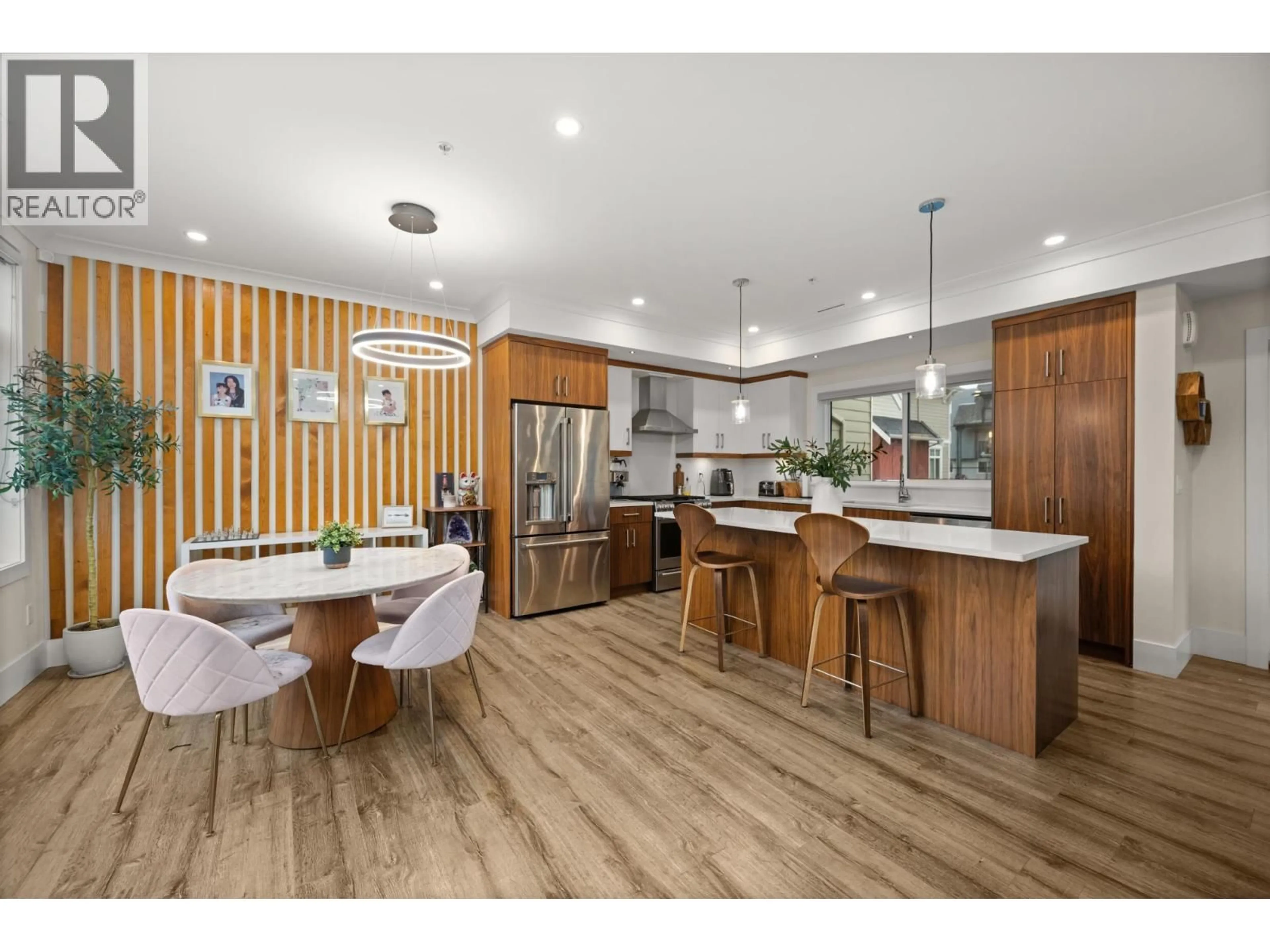 Open concept kitchen, wood/laminate floor for 4931 47A AVENUE, Ladner British Columbia V4K0E1