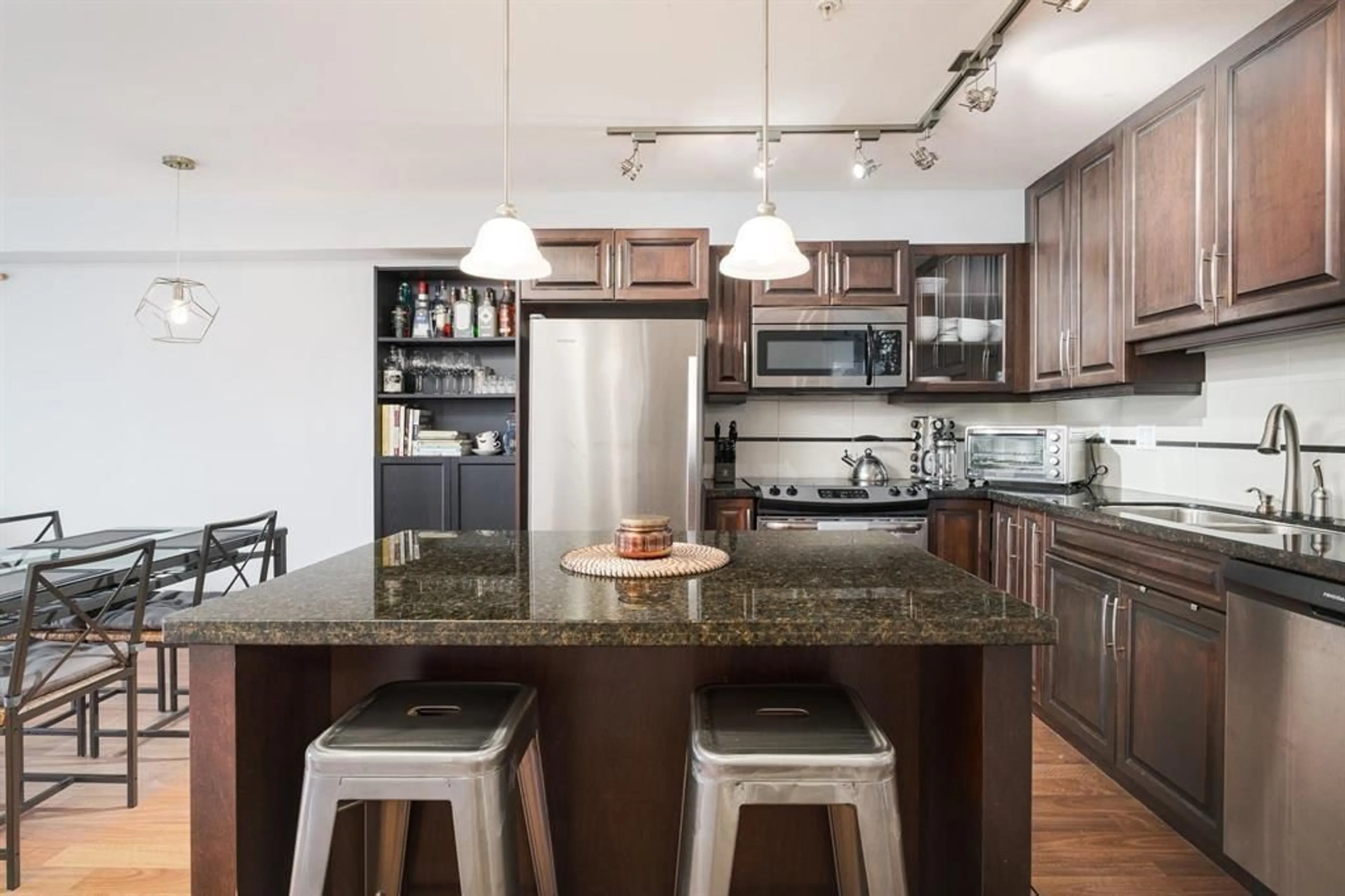 Open concept kitchen, unknown for 312 - 19939 55A AVENUE, Langley British Columbia V3A3X4