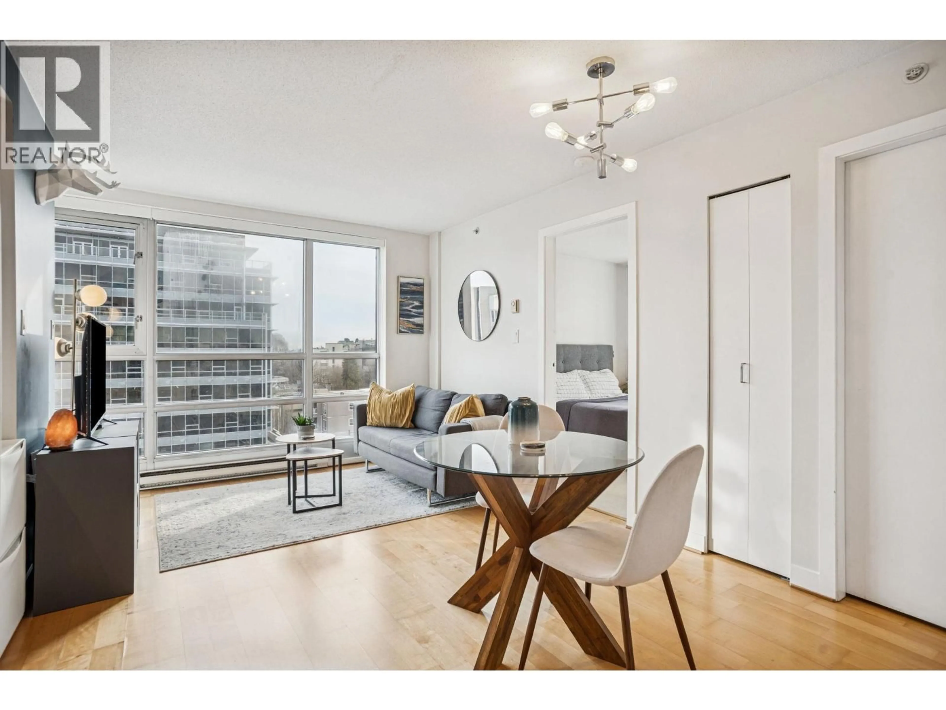 Living room with furniture, wood/laminate floor for 901 - 1030 BROADWAY STREET, Vancouver British Columbia V6H4J5