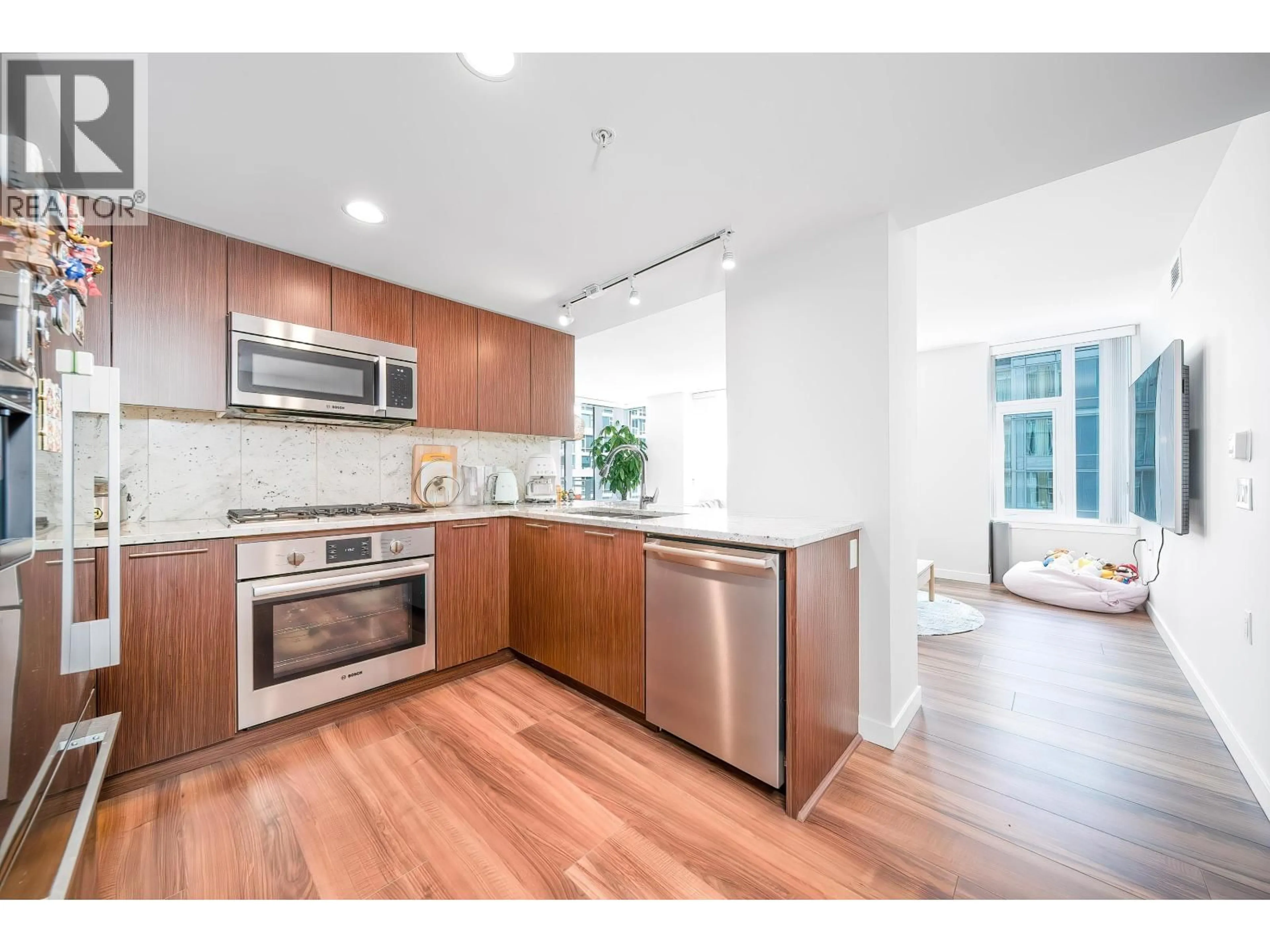 Open concept kitchen, unknown for 809 - 8699 HAZELBRIDGE WAY, Richmond British Columbia V6X0T4