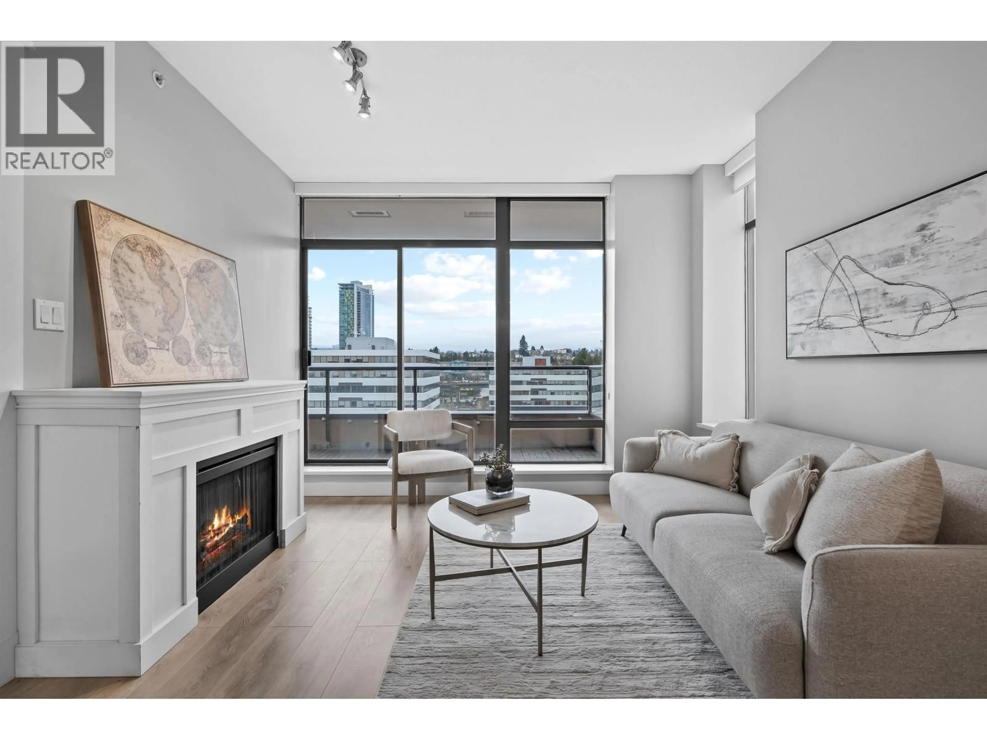 Living room with furniture, wood/laminate floor for 902 - 4250 DAWSON STREET, Burnaby British Columbia V5C4B1