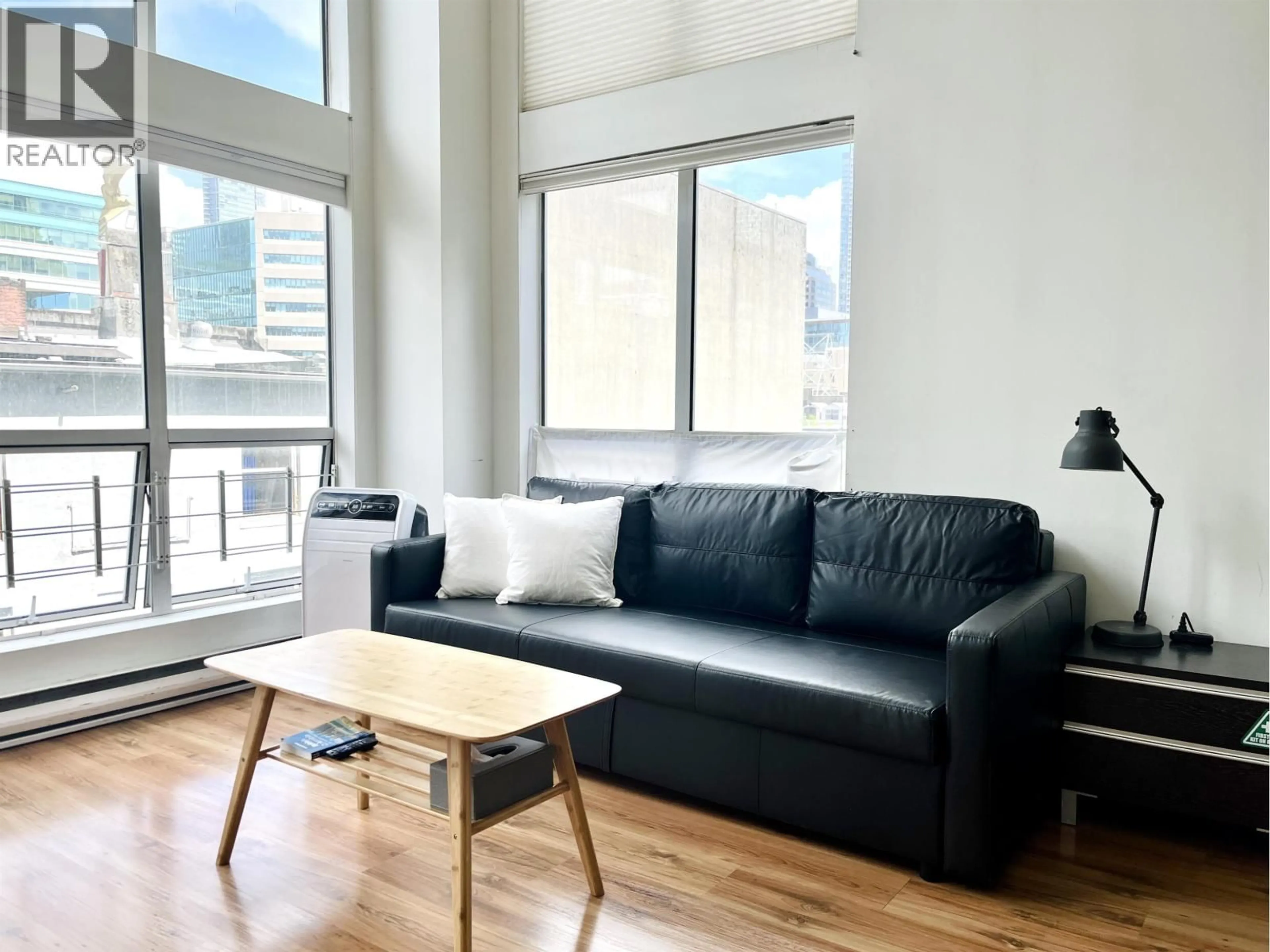 Living room with furniture, wood/laminate floor for 403 - 933 SEYMOUR STREET, Vancouver British Columbia V6B6L6