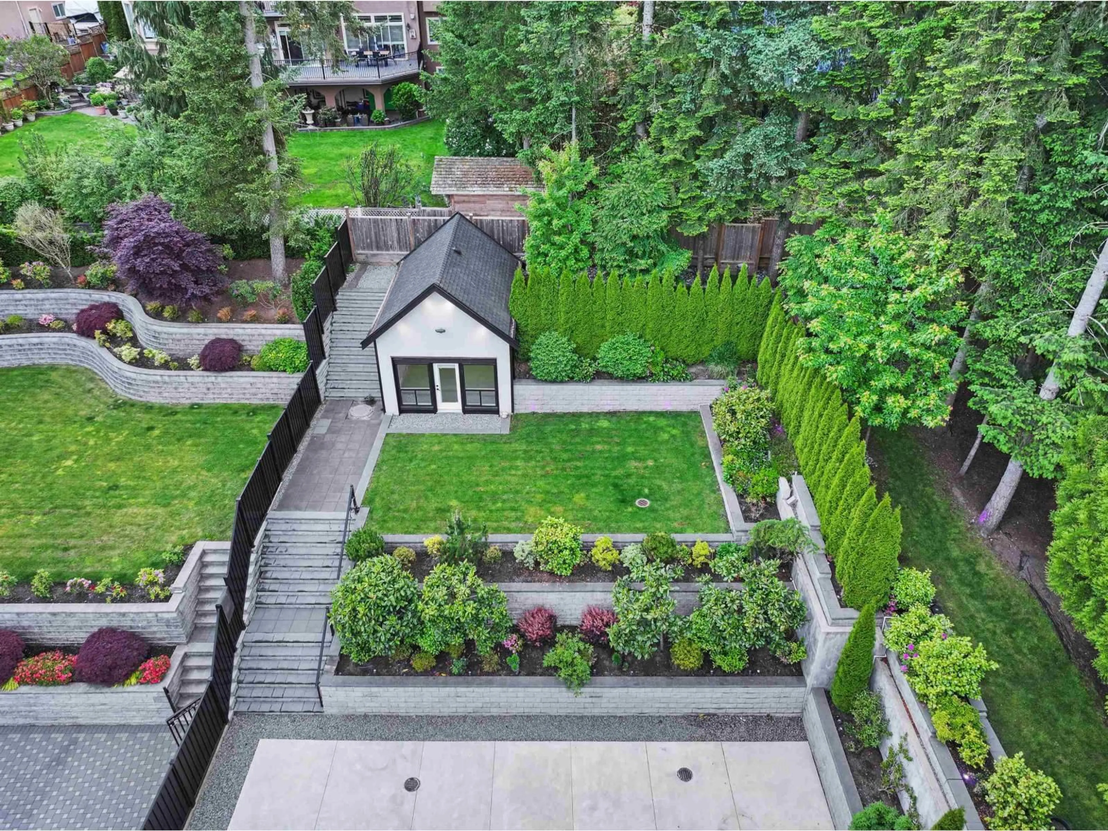 A pic from outside/outdoor area/front of a property/back of a property/a pic from drone, street for 9075 164 STREET, Surrey British Columbia V4N2Z9