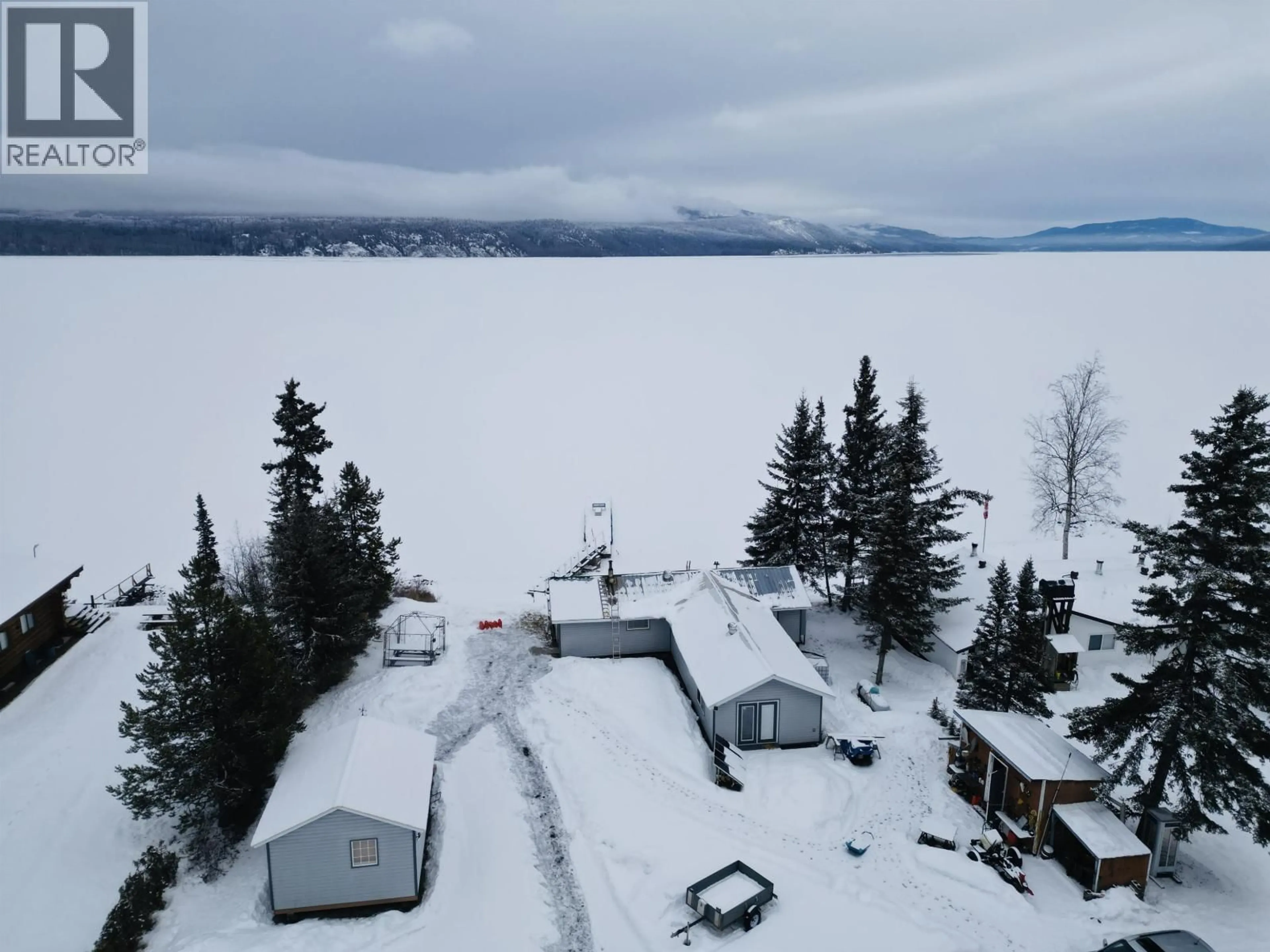 A pic from outside/outdoor area/front of a property/back of a property/a pic from drone, water/lake/river/ocean view for 39722 BABINE LAKE ROAD, Burns Lake British Columbia V0J1E0