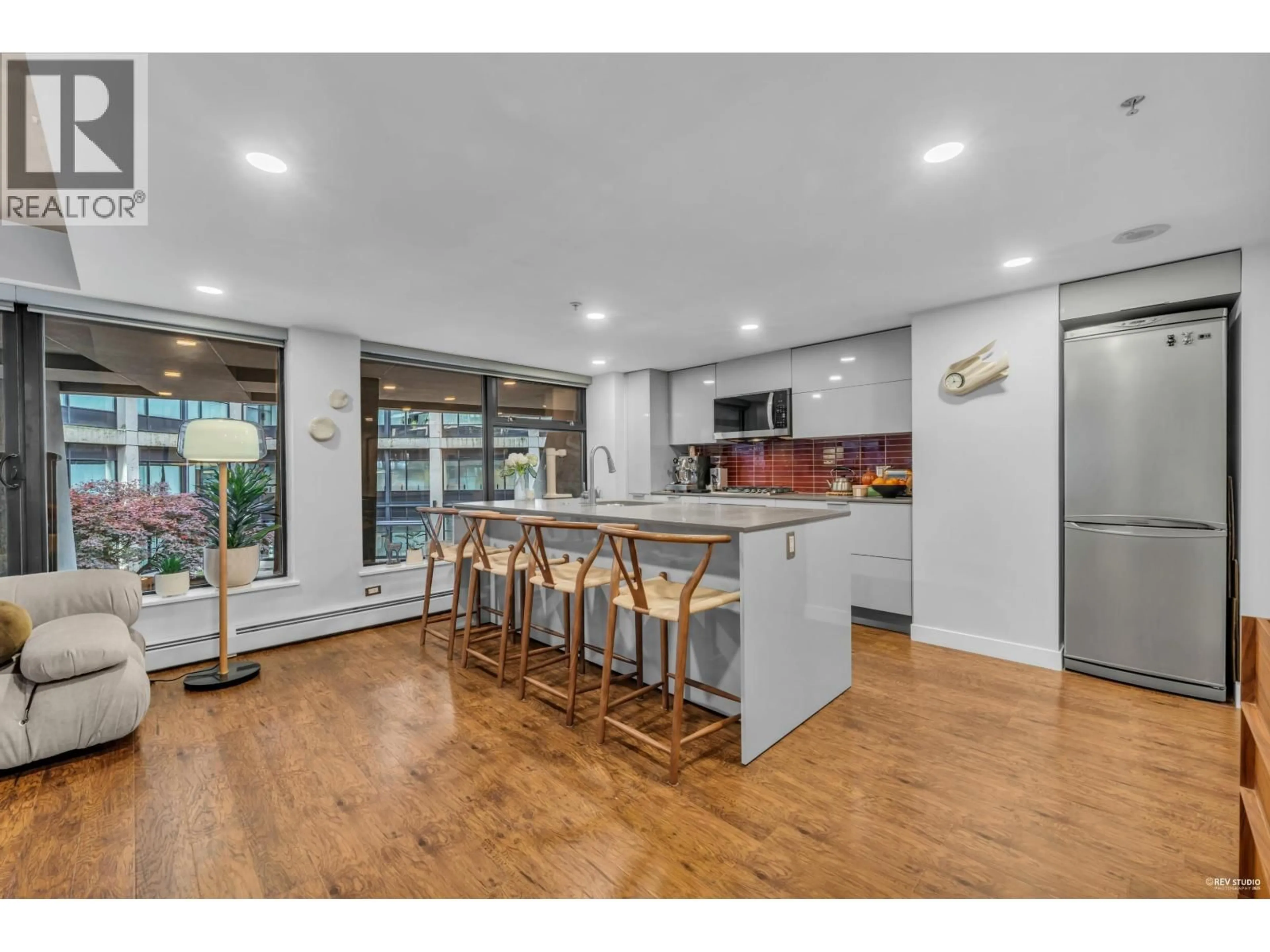 Open concept kitchen, wood/laminate floor for 605 - 128 CORDOVA STREET, Vancouver British Columbia V6B0E6