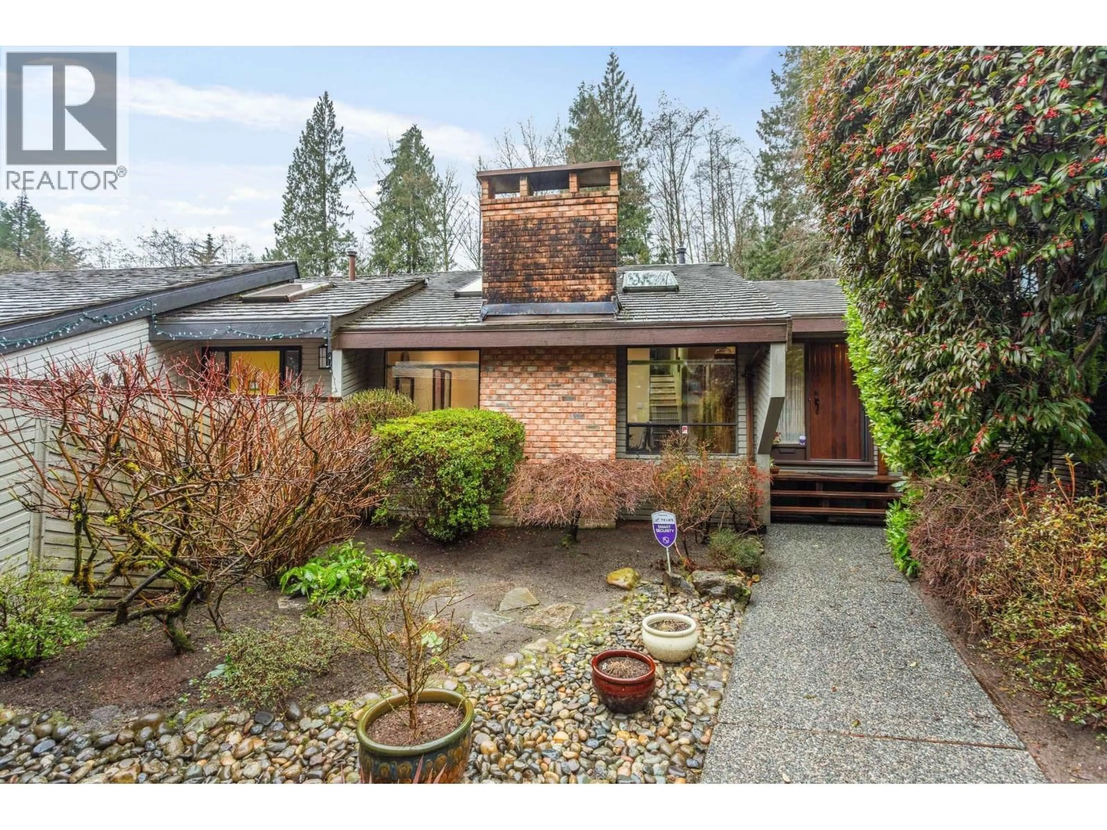 Home with brick exterior material, street for 5639 WHITE PINE LANE, North Vancouver British Columbia V7R4S1