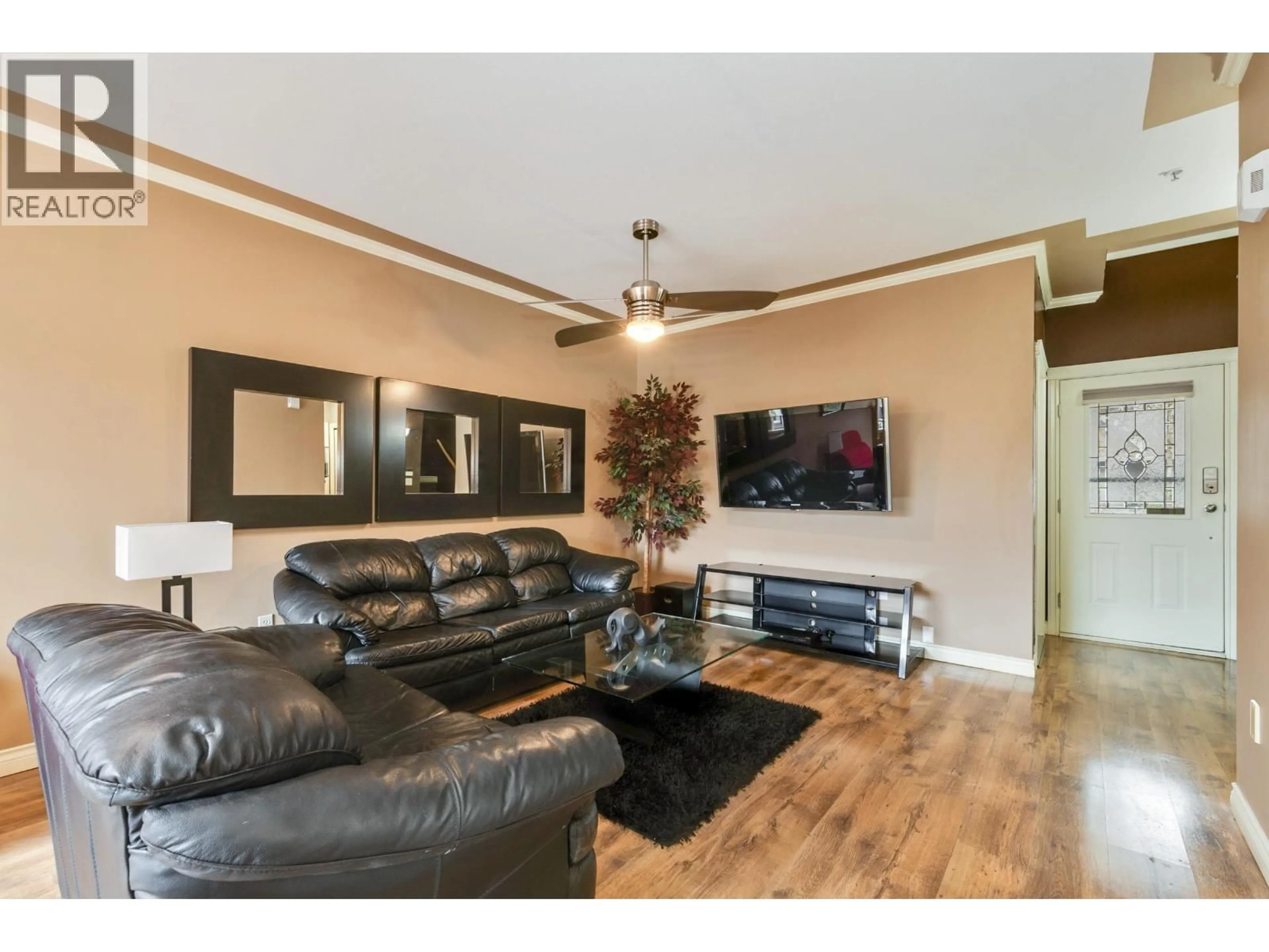 Living room with furniture, wood/laminate floor for 8 - 19148 124 AVENUE, Pitt Meadows British Columbia V3Y2V2