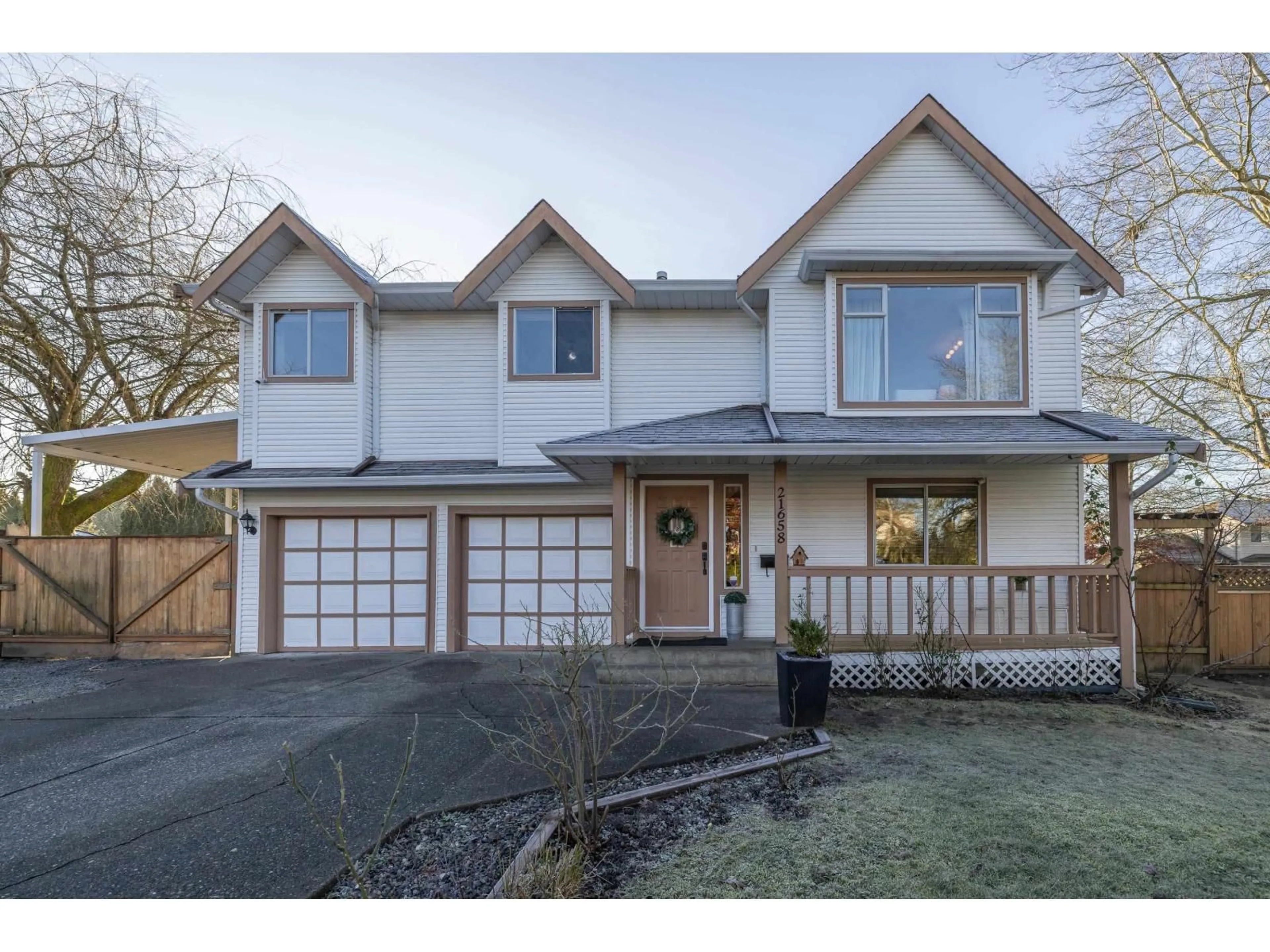 Home with vinyl exterior material, street for 21658 50B AVENUE, Langley British Columbia V3A8W8